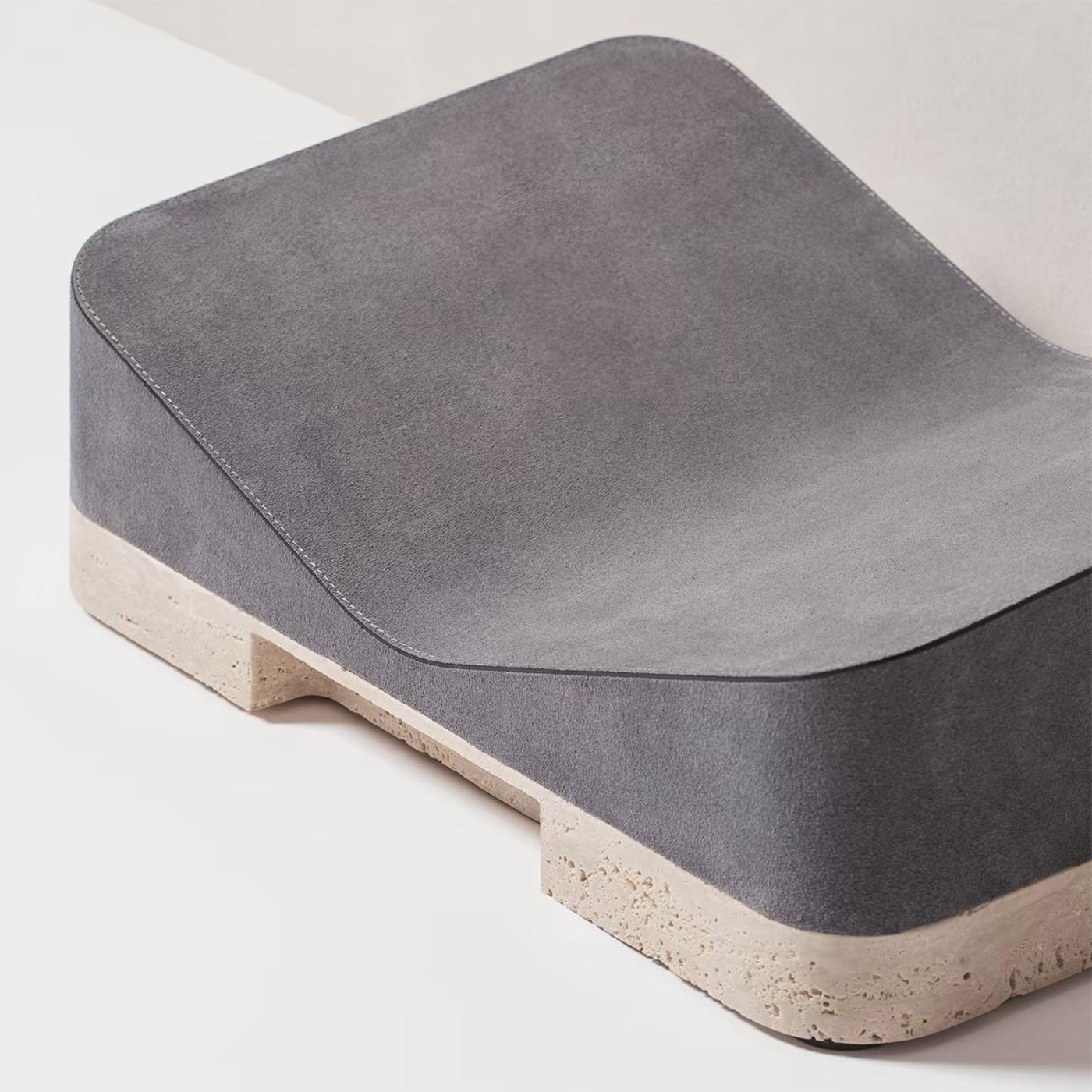Bookrest Sweden Travertine with all structure
in travertine and with sweden leather covering
in blue color.
Also available with other with sweden leather 
covering colors, on request.