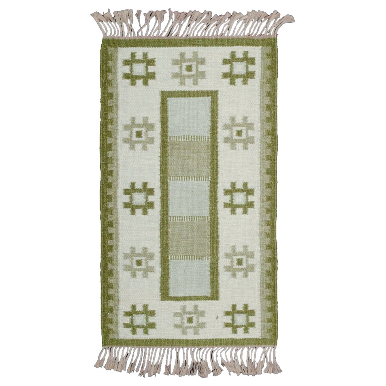 Tapis en laine de Suède selon la technique Rölakan. Couleurs vertes sur fond blanc.