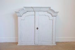 Swedish 1770s Rococo Painted Wall Cabinet with Chapeau de Gendarme Style Cornice
