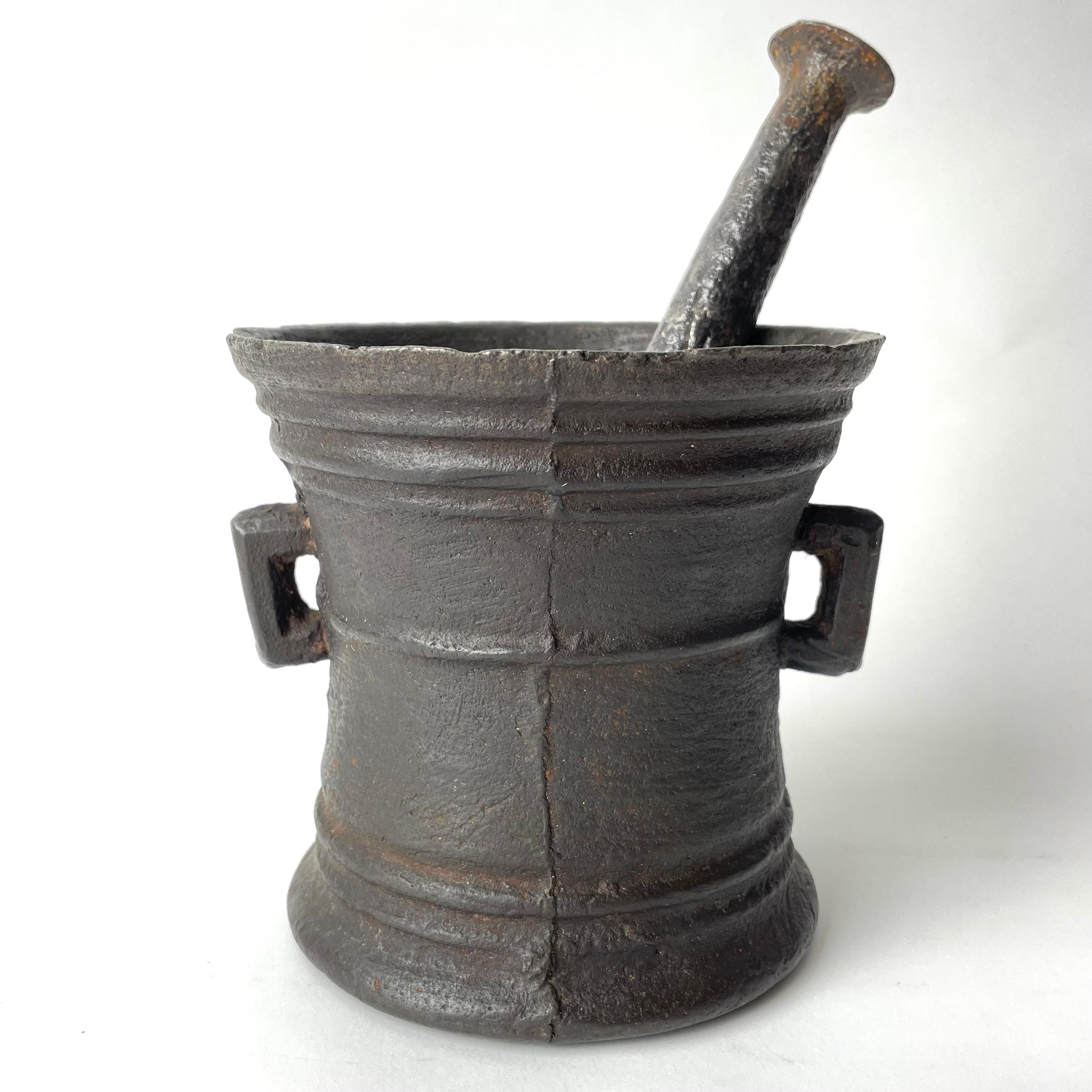 Wonderful Swedish 17th Century Mortar with Pestle in cast iron with charming patina.


Wear consistent with age and use 