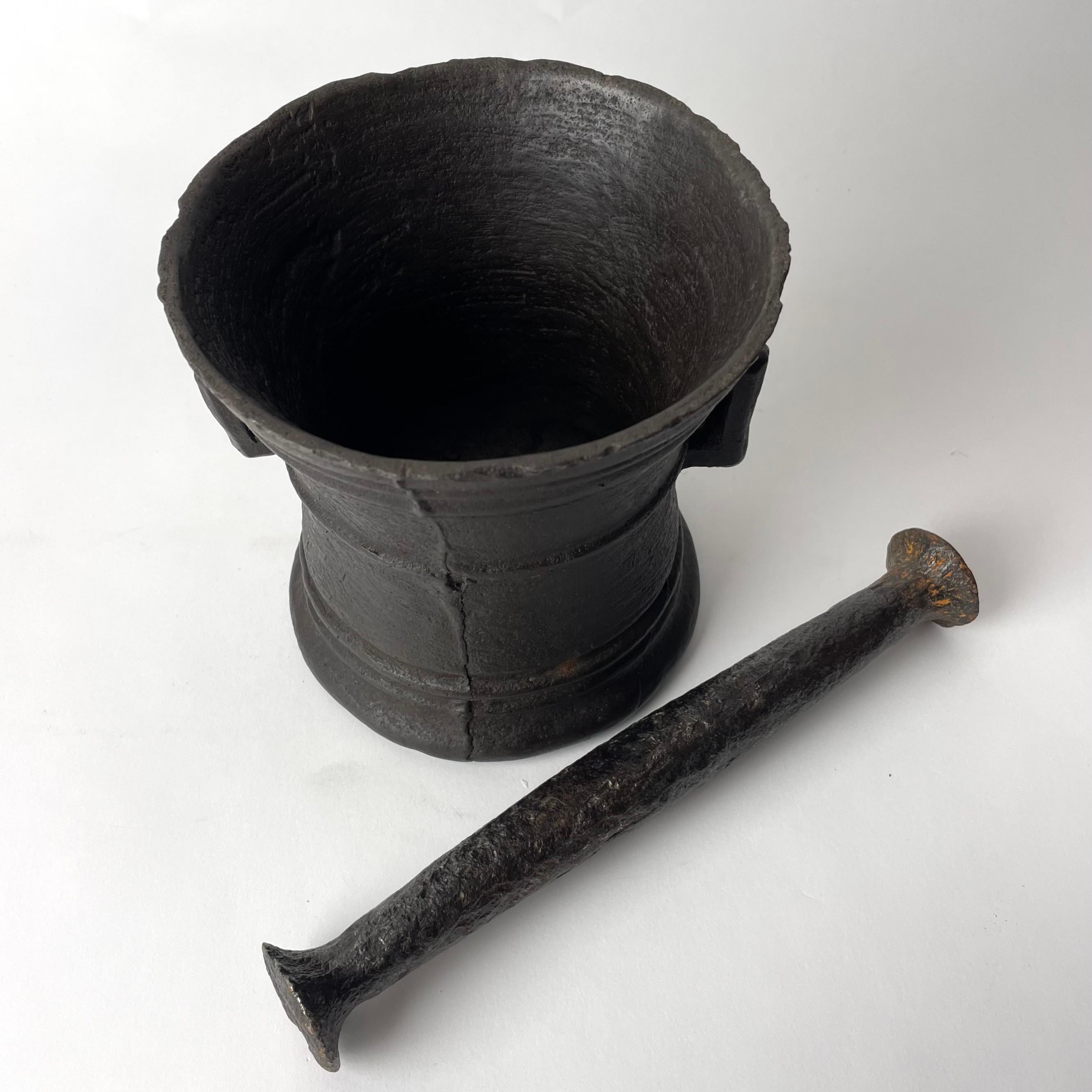 Cast Swedish 17th Century Mortar with Pestle in cast iron with wonderful patina For Sale