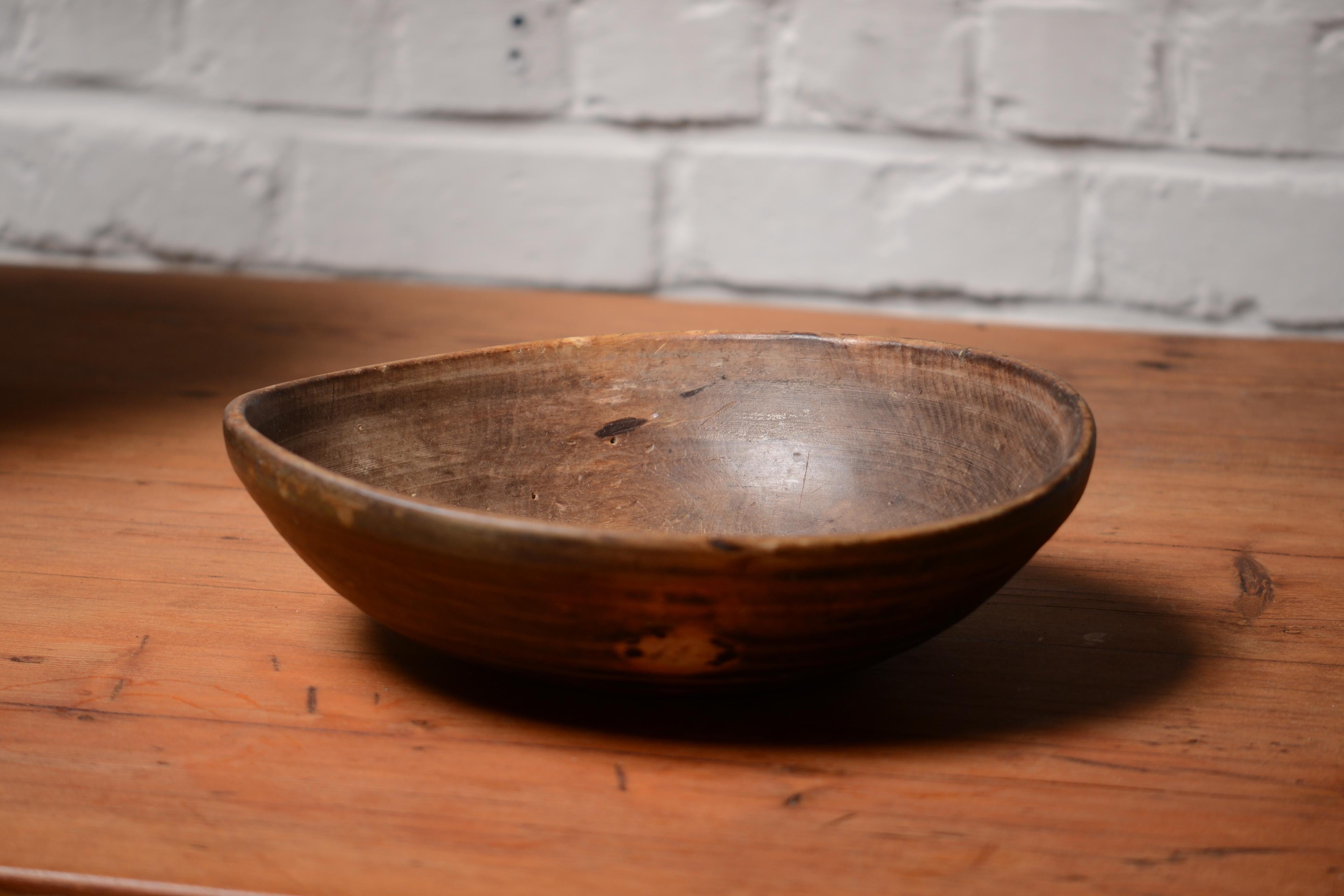 Folk art Swedish bowl in hardwood, hand carved by a peasant circa 1800. Some traces of use. Different shades of brown and green with a fantastic patina. Lots of history and a warm feeling.