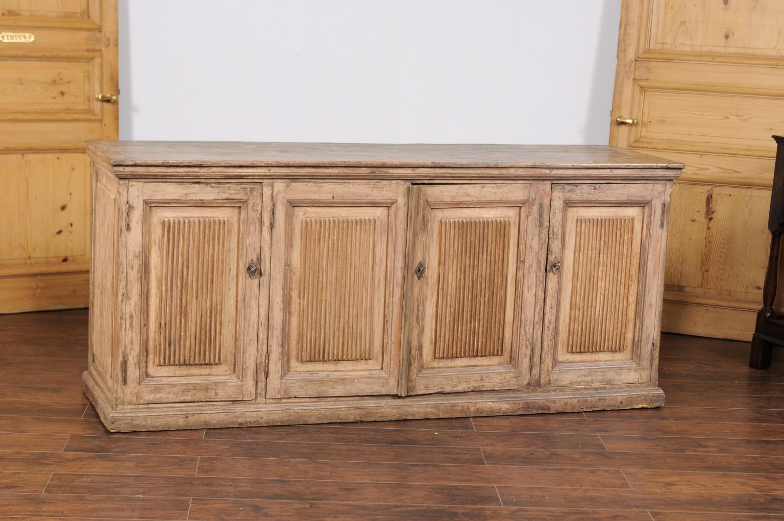 19th Century Swedish 1820s Four-Door Pine Enfilade with Fluted Motifs and Hidden Drawers
