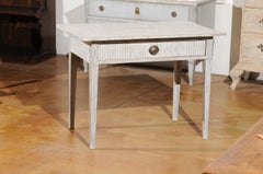 Swedish 1820s Gustavian Style Painted Wood Table with Drawer and Reeded Accents