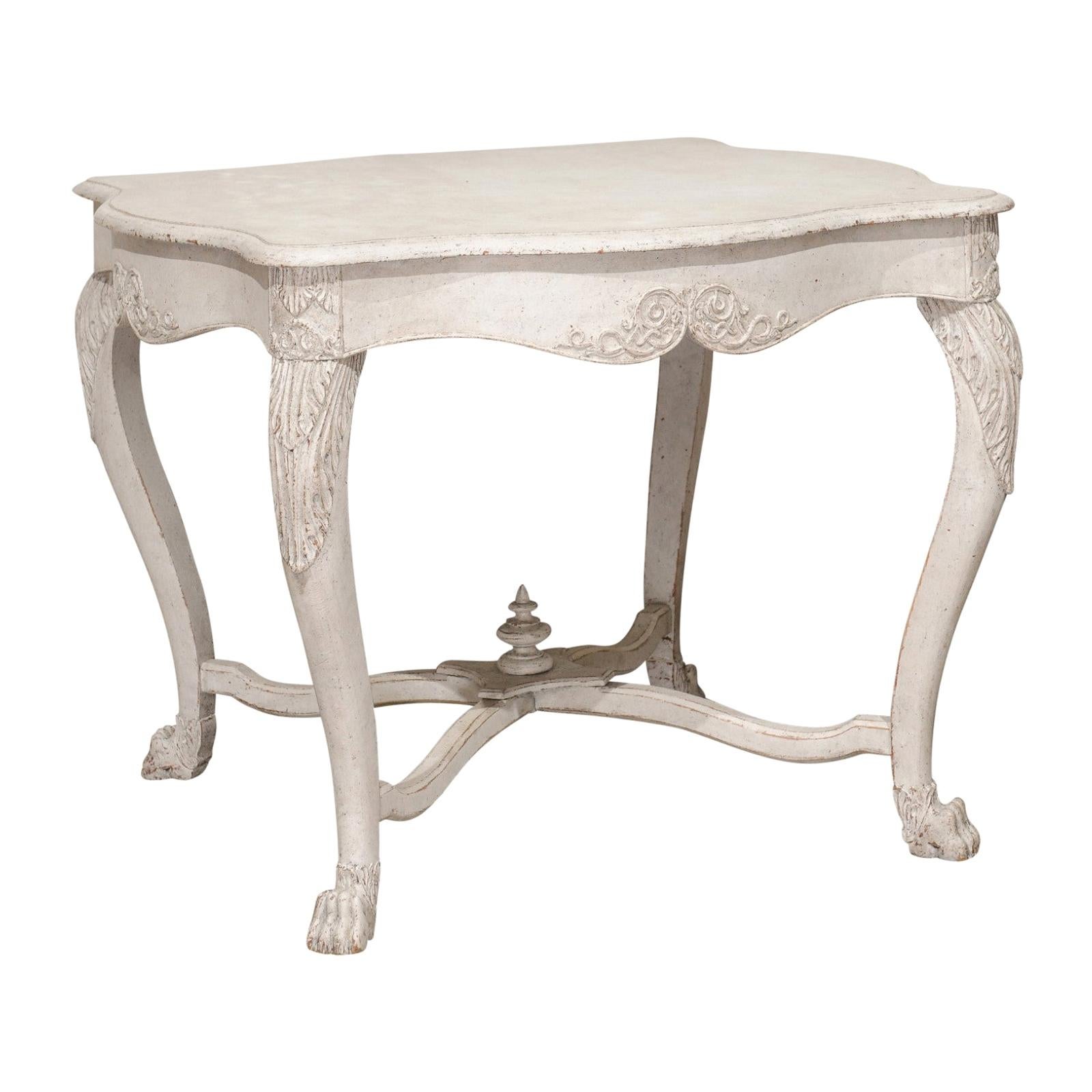 Swedish 1850s Painted Center Table with Carved Volutes and Cross Stretcher For Sale