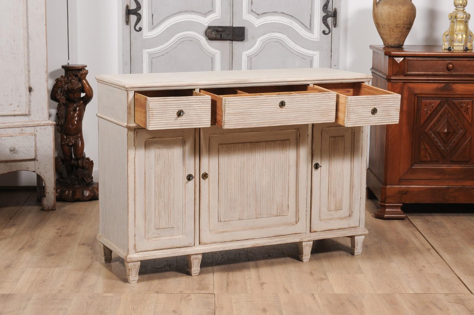 Carved Swedish 1860s Creamy Gray Painted Sideboard with Reeded Doors and Drawers For Sale