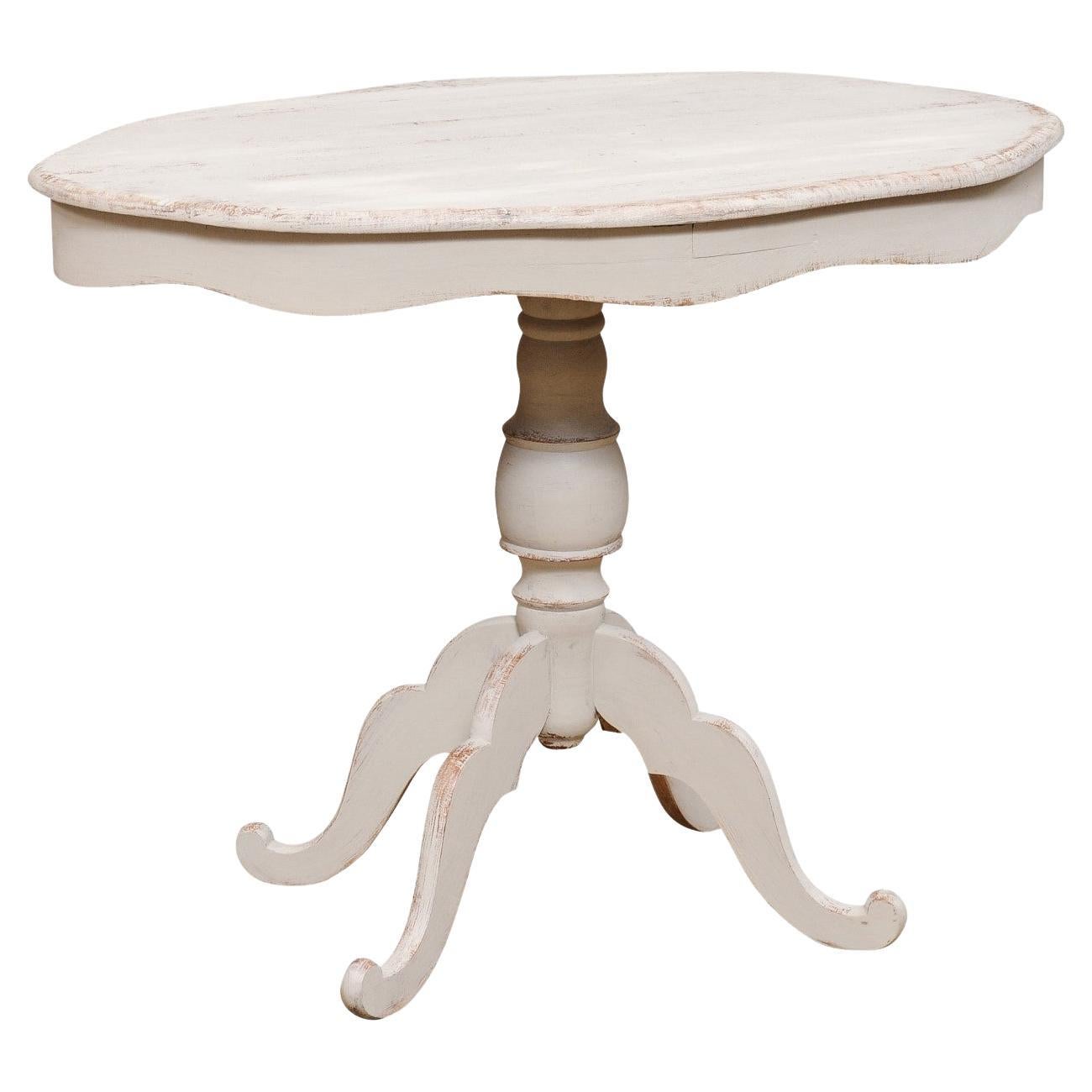 Swedish 1860s Painted Oval Pedestal Table with Carved Apron and Quadripod Base For Sale