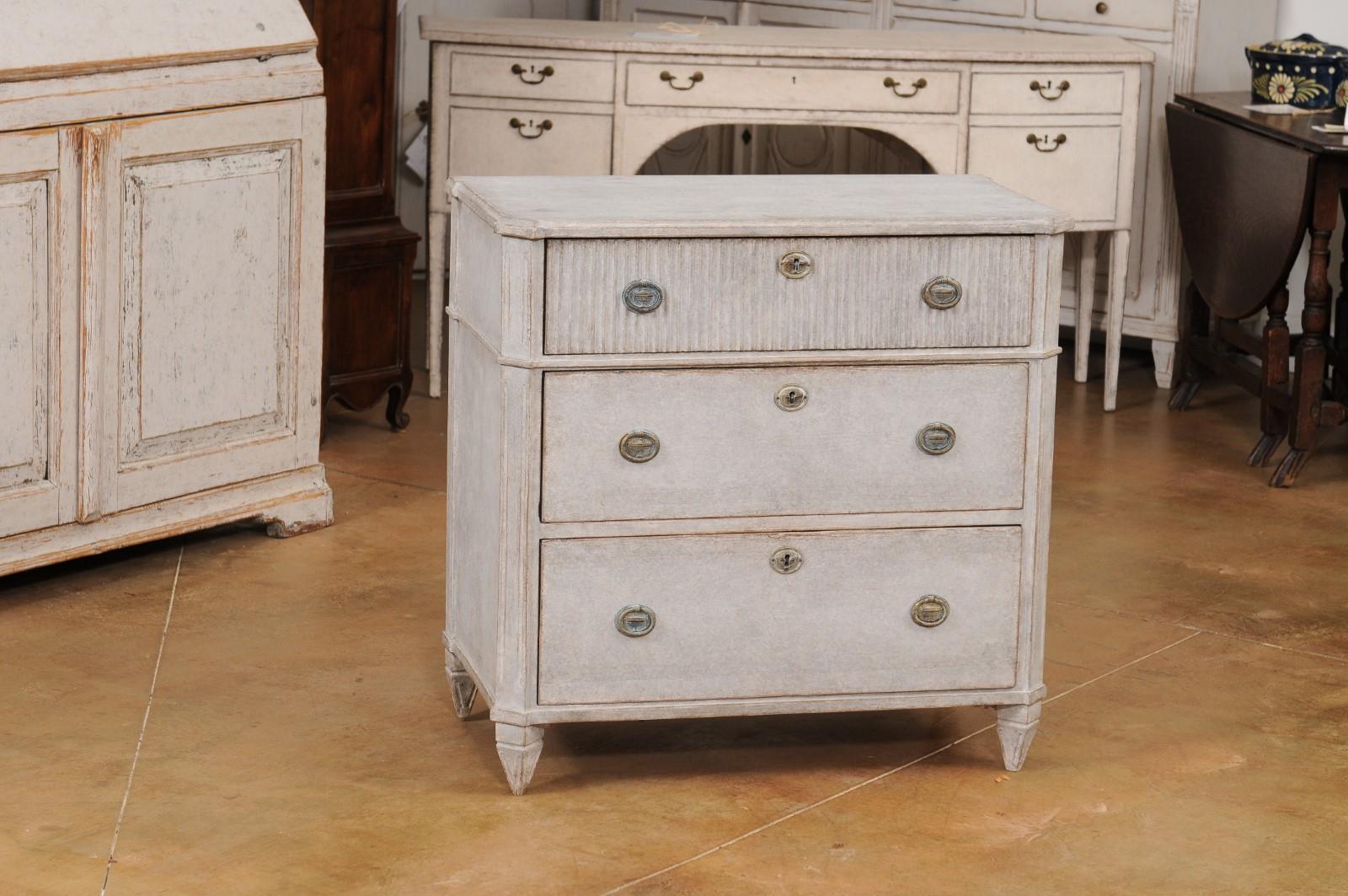 Carved Swedish 1890s Gustavian Style Gray Painted Three Drawer Chest with Reeded Motifs For Sale