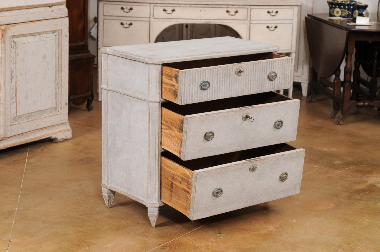 Swedish 1890s Gustavian Style Gray Painted Three Drawer Chest with Reeded Motifs For Sale 1