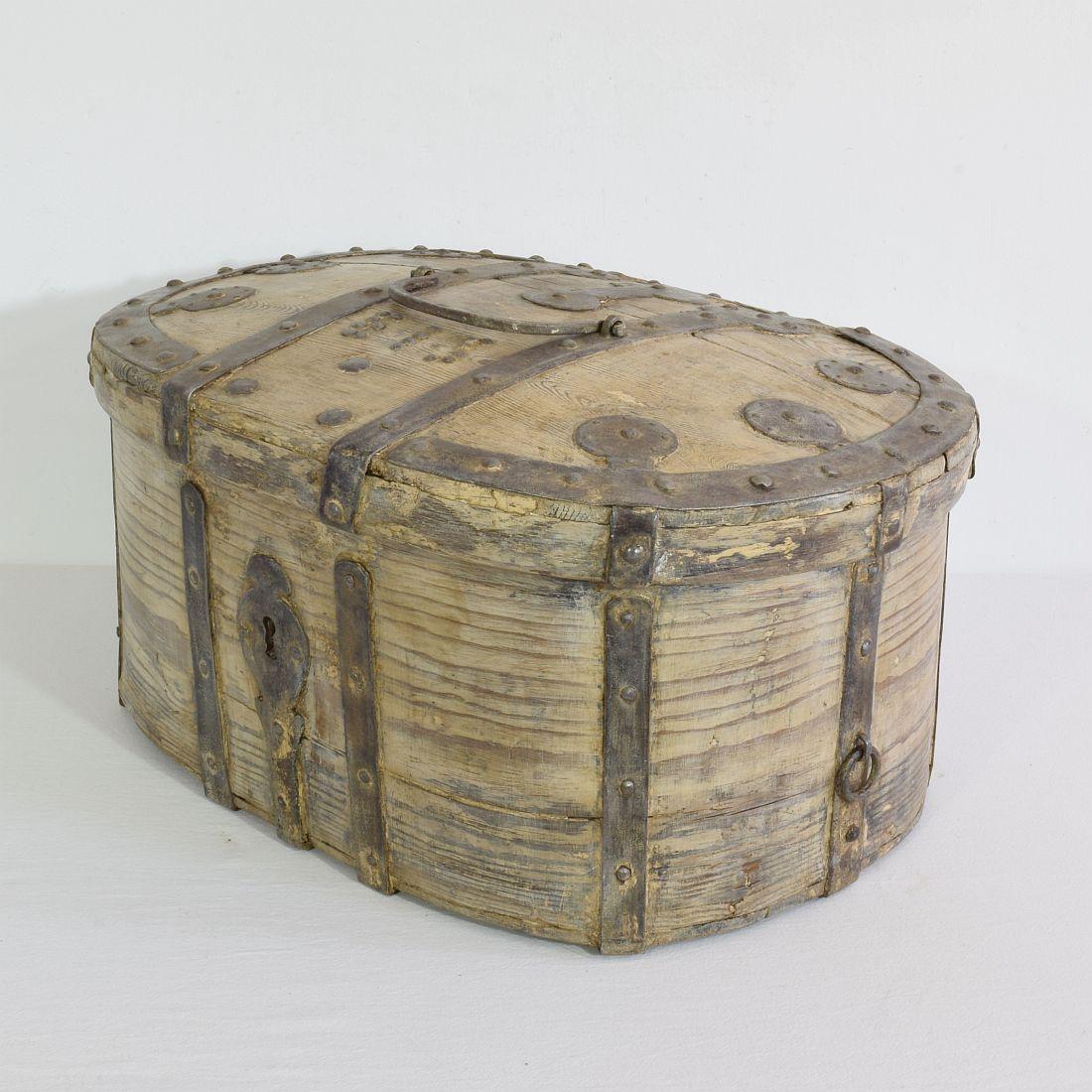 Rare Swedish travel box with stunning patina and hand forged iron details.
Sweden, circa 1750-1850. Weathered, small losses and old repairs.
   