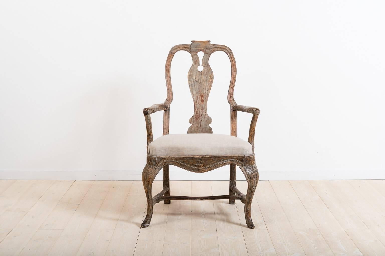 A very elegant Swedish, 18th century Baroque armchair, Stockholm circa 1760, dry scraped back to its original color.