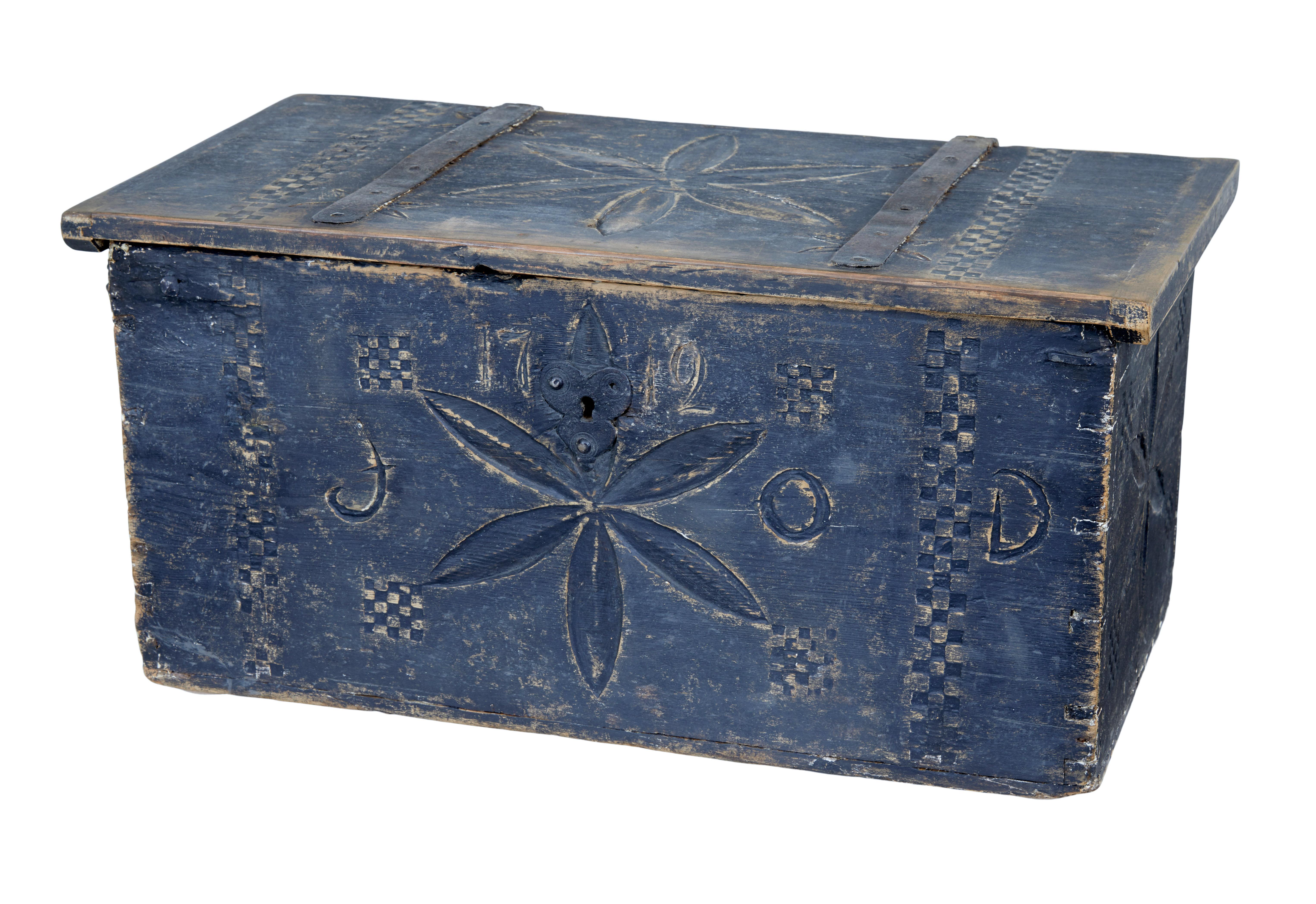 Swedish 18th century carved pine painted chest circa 1712.

Beautiful painted rustic hinged box, which at over 300 years old is still ready for everyday use.

Dated 1712 on the front, also with the initials j o d. Hand carved on all surfaces