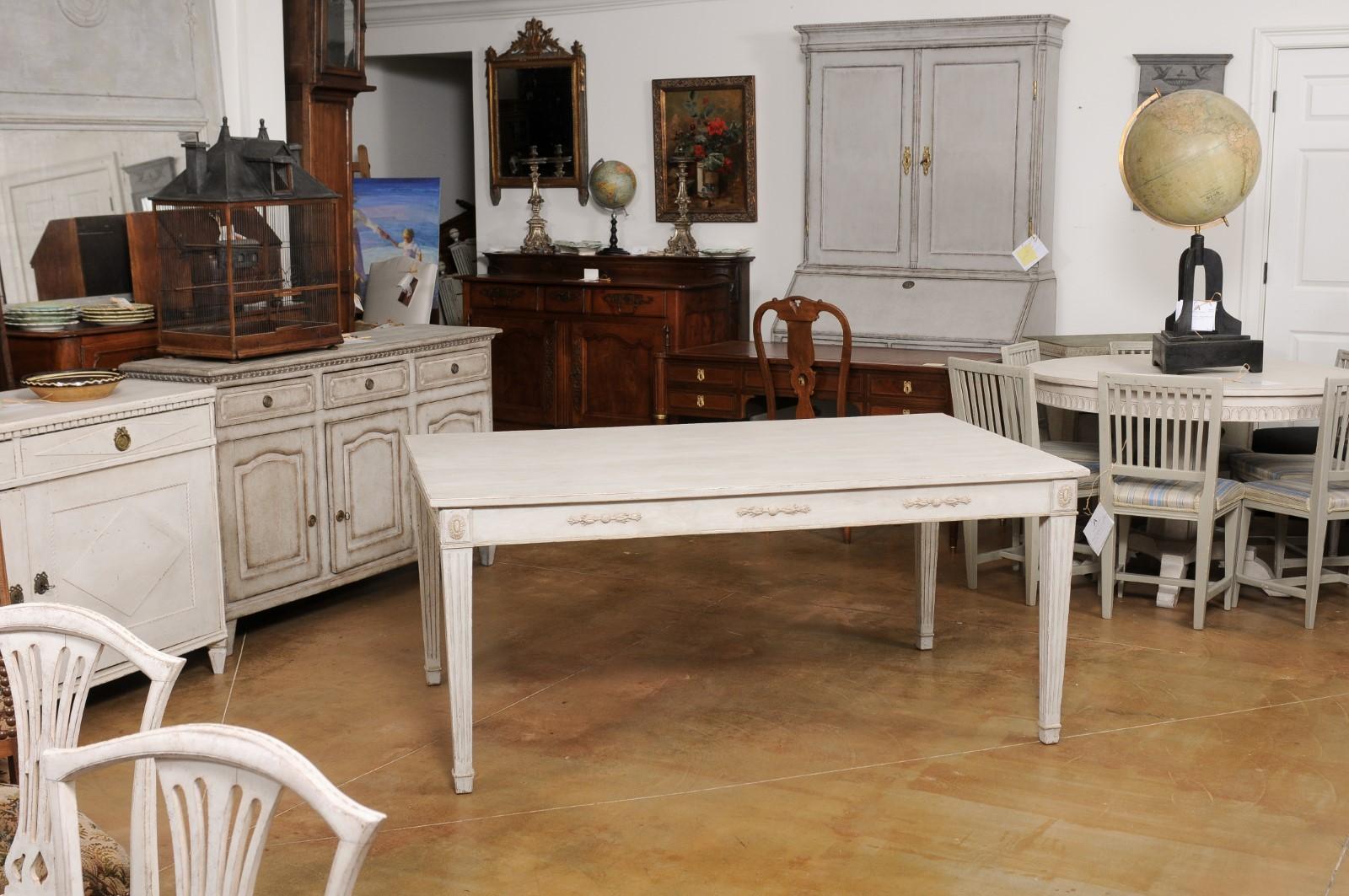 Painted Swedish 1900 Gustavian Style Dining Table with Carved Apron and Fluted Legs For Sale