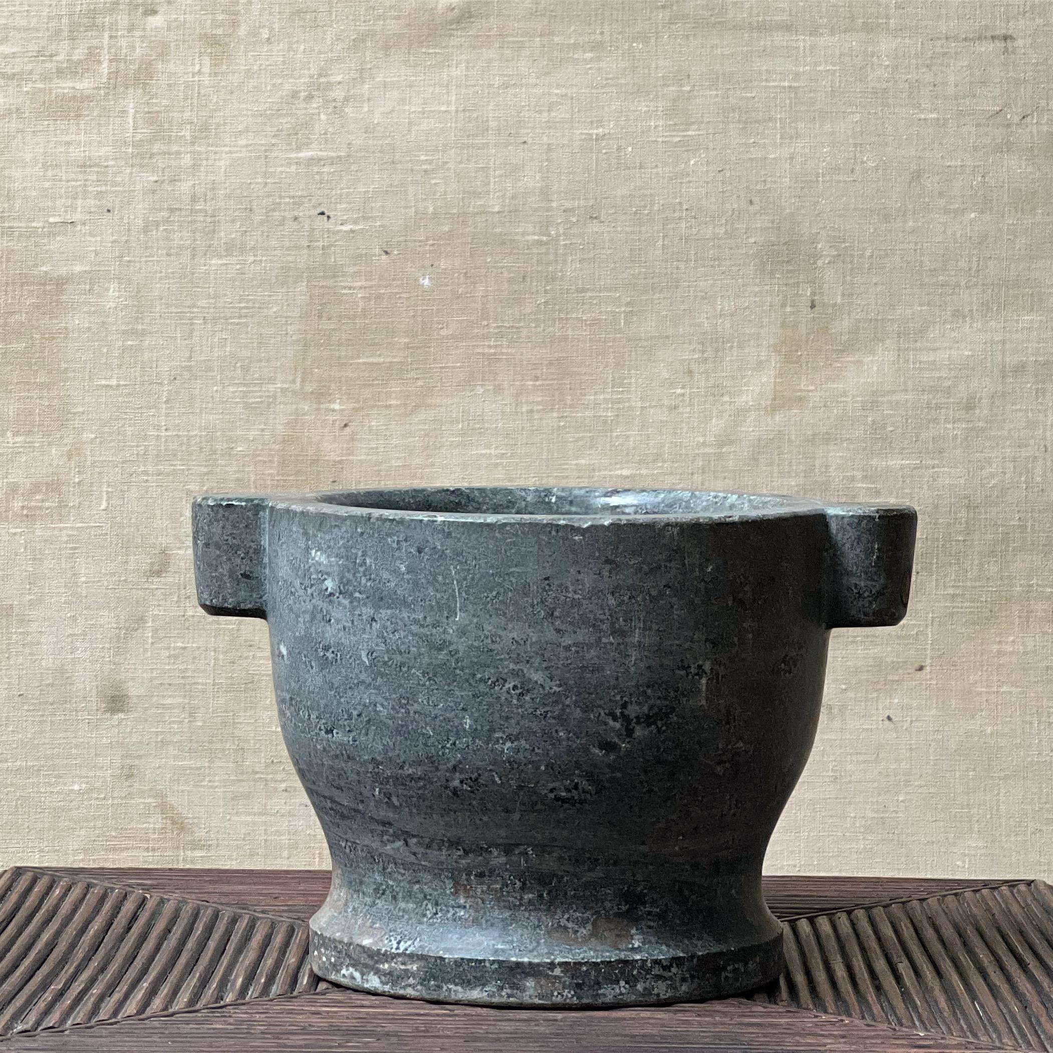 This mortar was found in sweden. It was handcrafted around 1900. It was definitely used as you can see some traces. Made of dark green / grey marble. Perfect as mortar, planter or decorative object. Different shades of green and grey with a