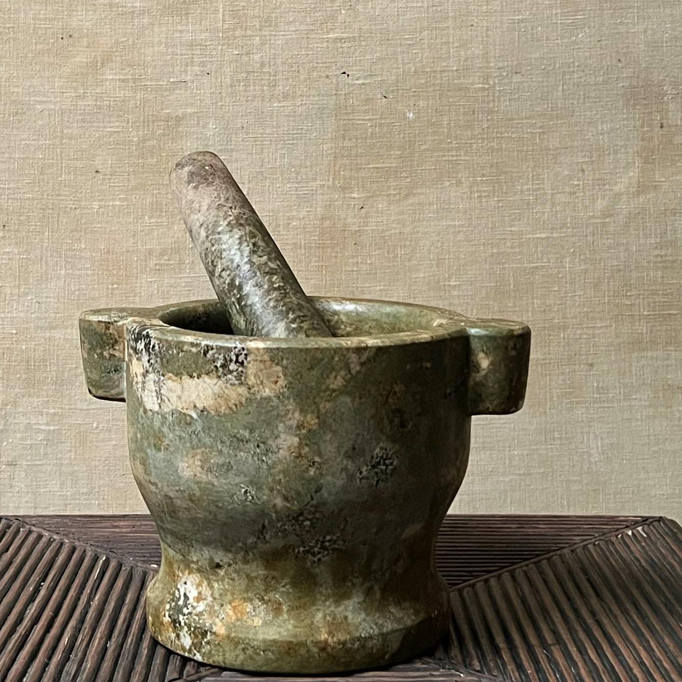 This mortar was found in sweden. It was handcrafted around 1900. It was definitely used as you can see some traces. Made of green marble. Perfect as mortar, planter or decorative object. Different shades of green and grey with a fantastic patina.