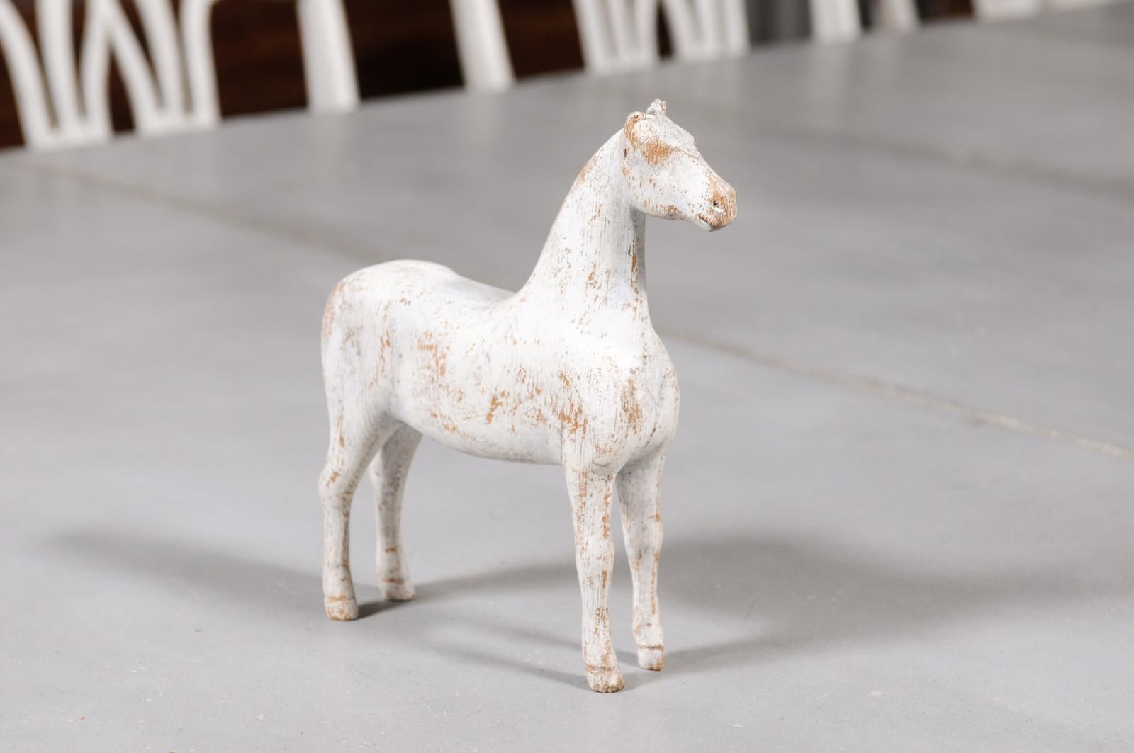 Rustic Swedish 1900s Painted Miniature Wooden Horse Sculpture with Distressed Patina