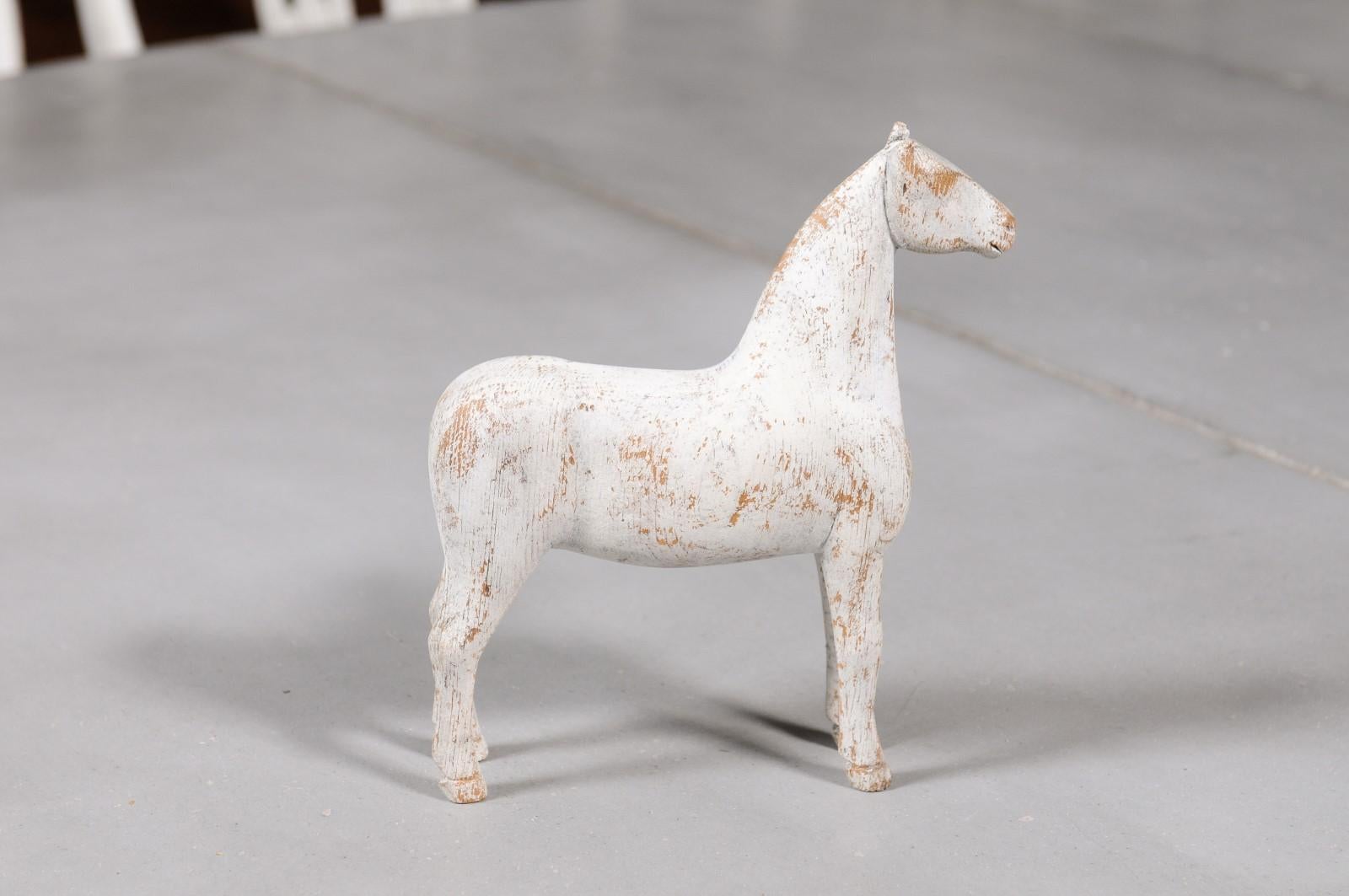 20th Century Swedish 1900s Painted Miniature Wooden Horse Sculpture with Distressed Patina