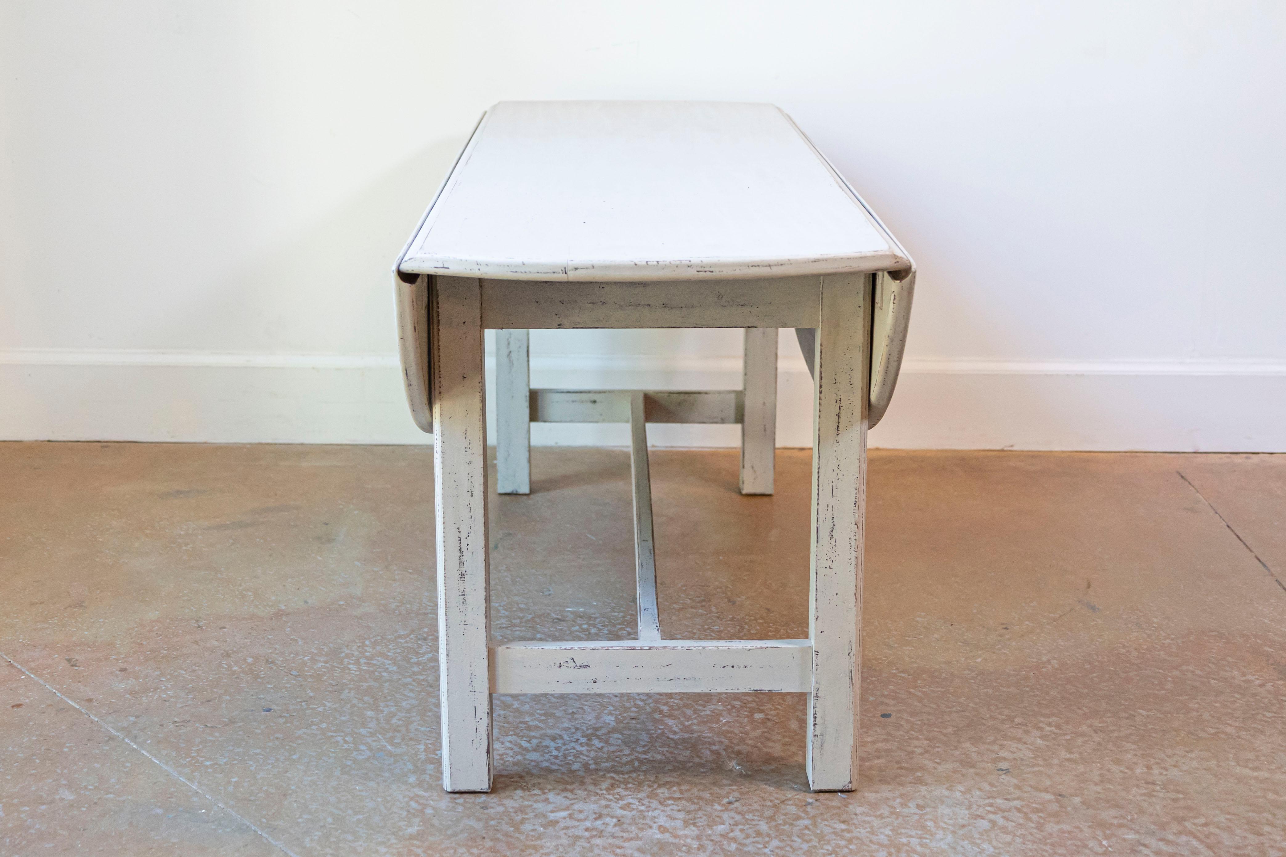 Wood Swedish 1920s Painted Drop Leaf Coffee Table with Oval Top and Stretcher