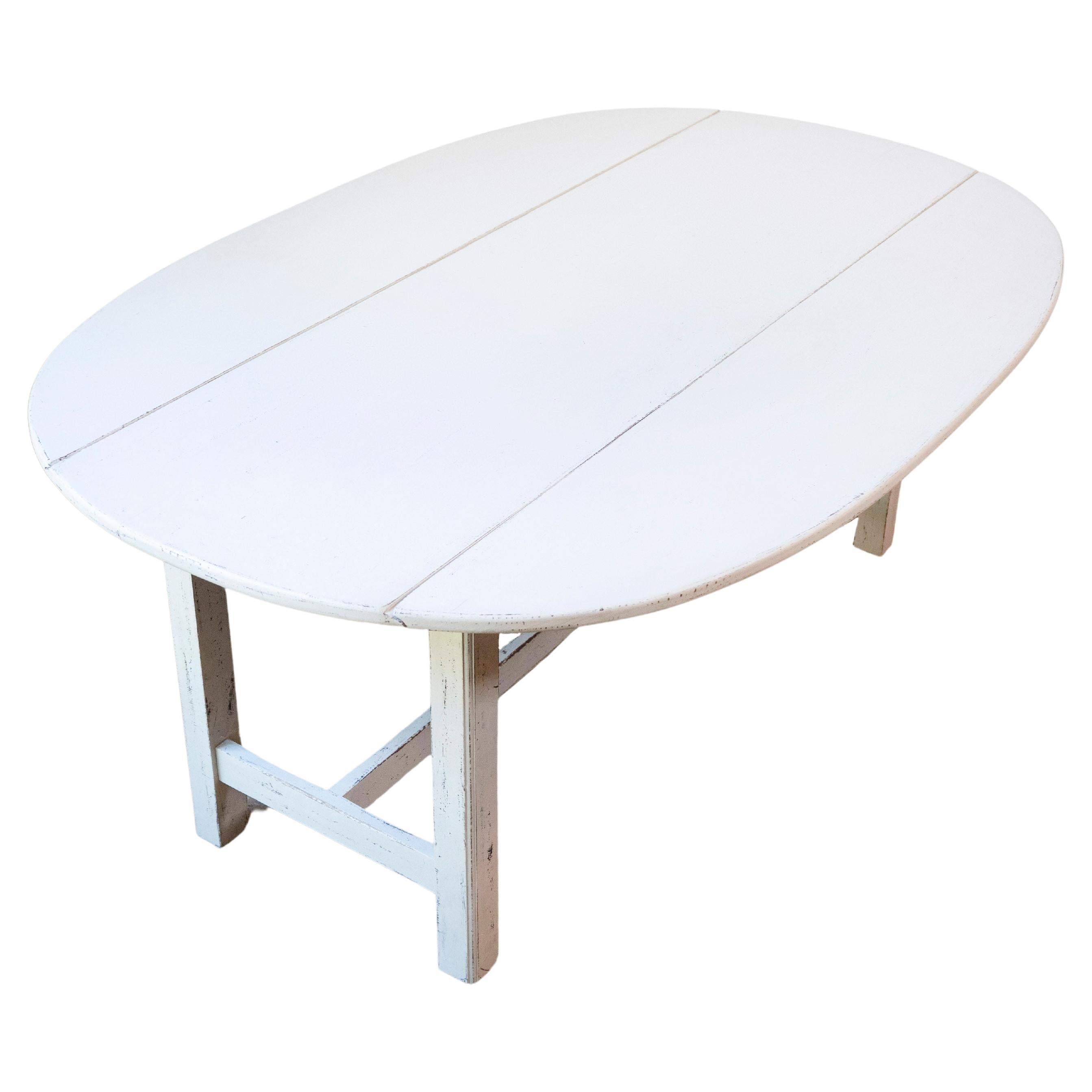 Swedish 1920s Painted Drop Leaf Coffee Table with Oval Top and Stretcher
