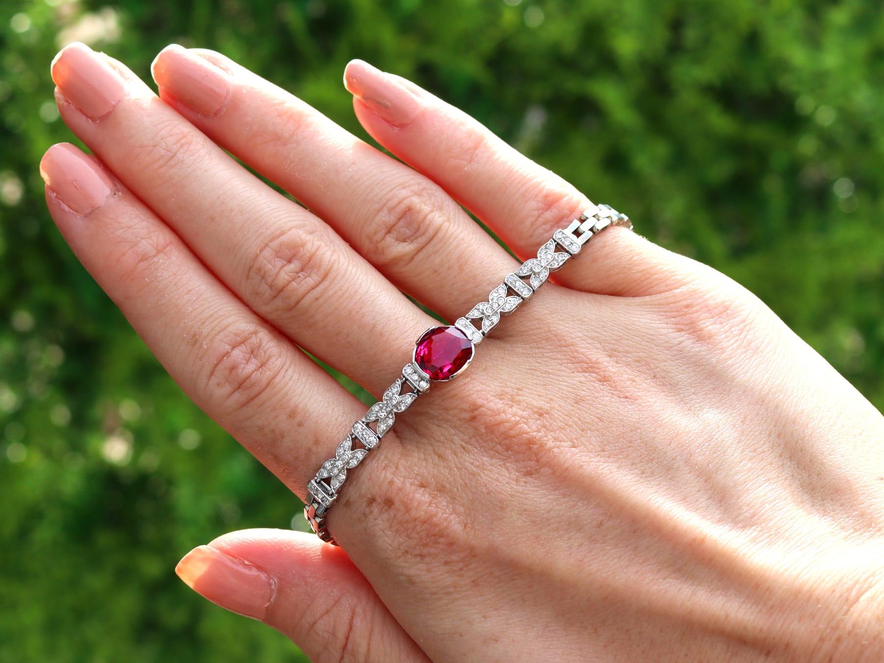 An impressive antique Swedish 2.27 carat garnet and 1.09 carat diamond, 18 karat white gold bracelet; part of our diverse antique jewelry and estate jewelry collections.

This stunning, fine and impressive bracelet has been crafted in 18k white