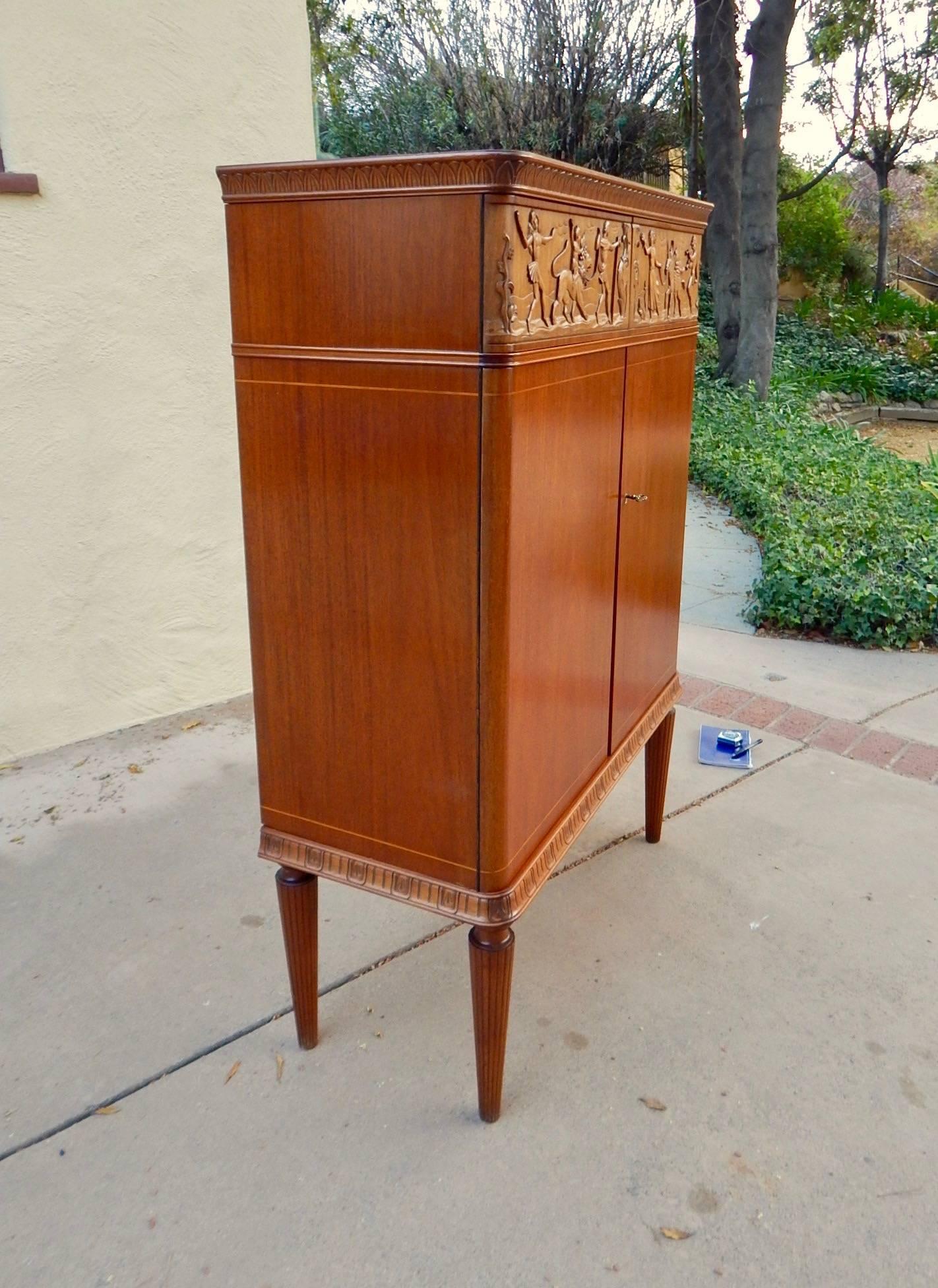 Mahogany Swedish, 1940s Moderne Storage Cabinet with Figural Relief by Eugene Höglund For Sale