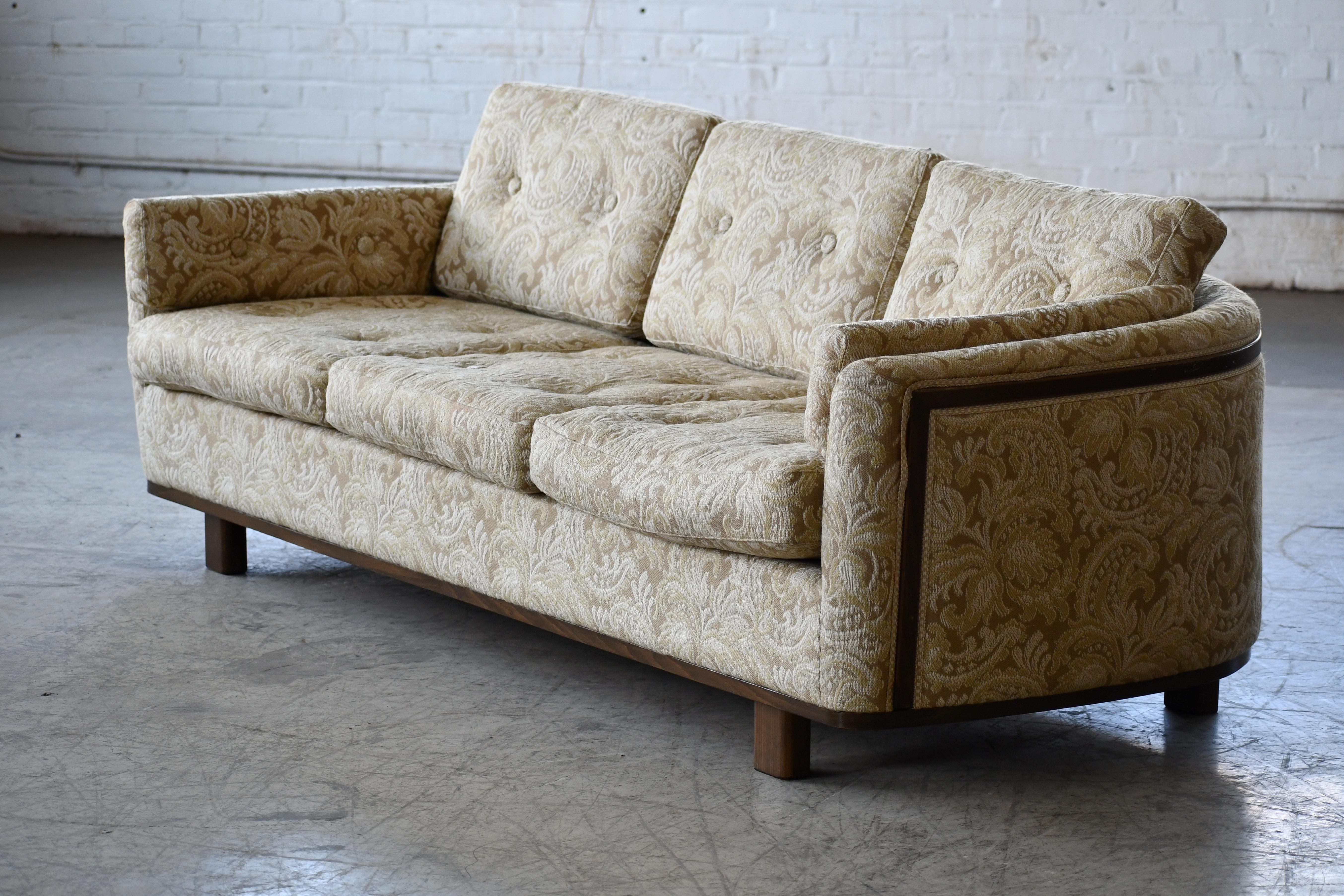 Mid-20th Century Swedish 1960's Sofa with Wooden Accents and Low Organic Proportions For Sale