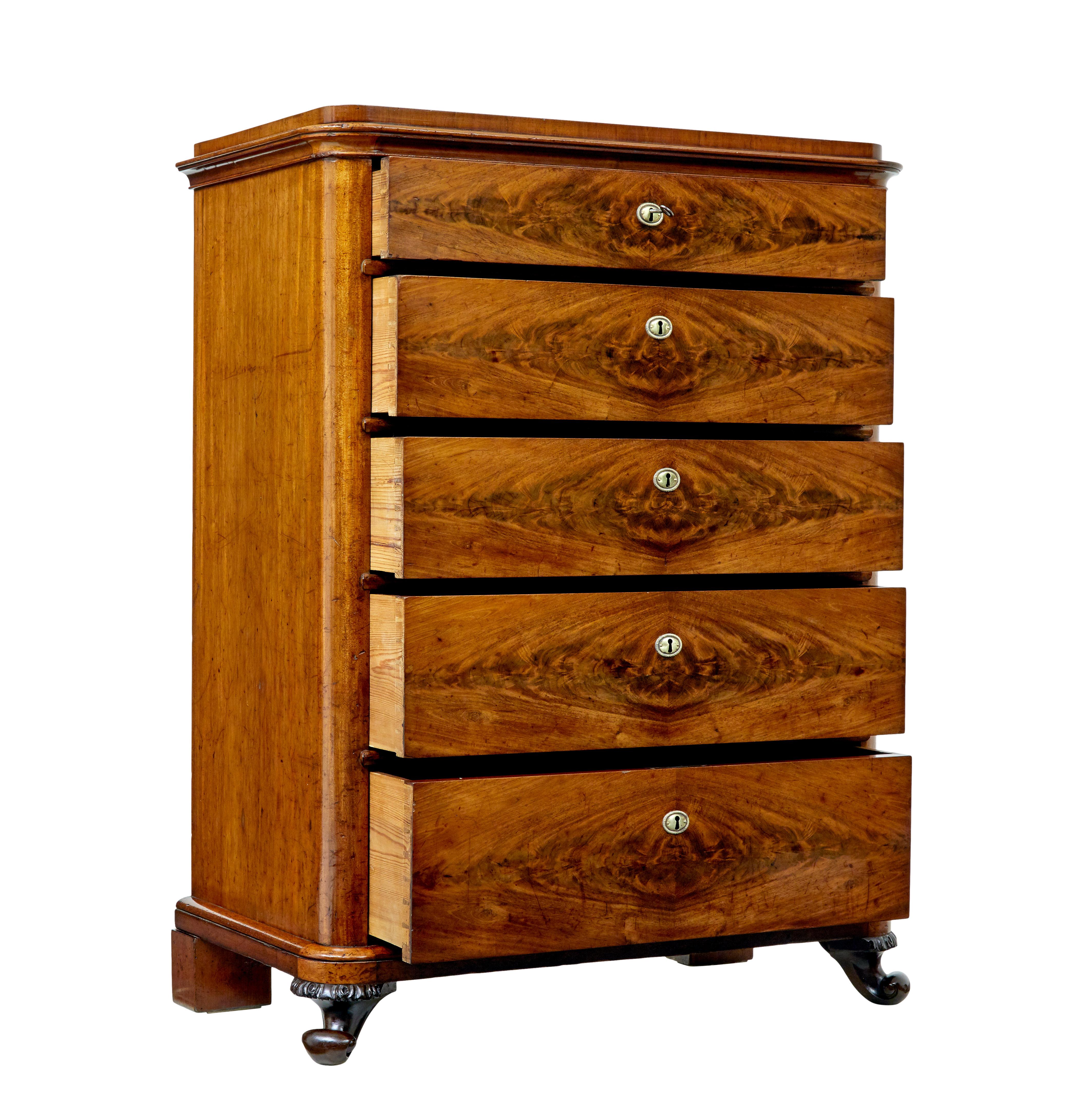 Swedish 19th century 5 drawer chest of drawers circa 1870.

Fine quality Scandinavian chest of drawers made in mahogany.  Stepped top with moulded edge, below which are 5 5 graduating drawers beautifully veneered in flame mahogany, each opening on