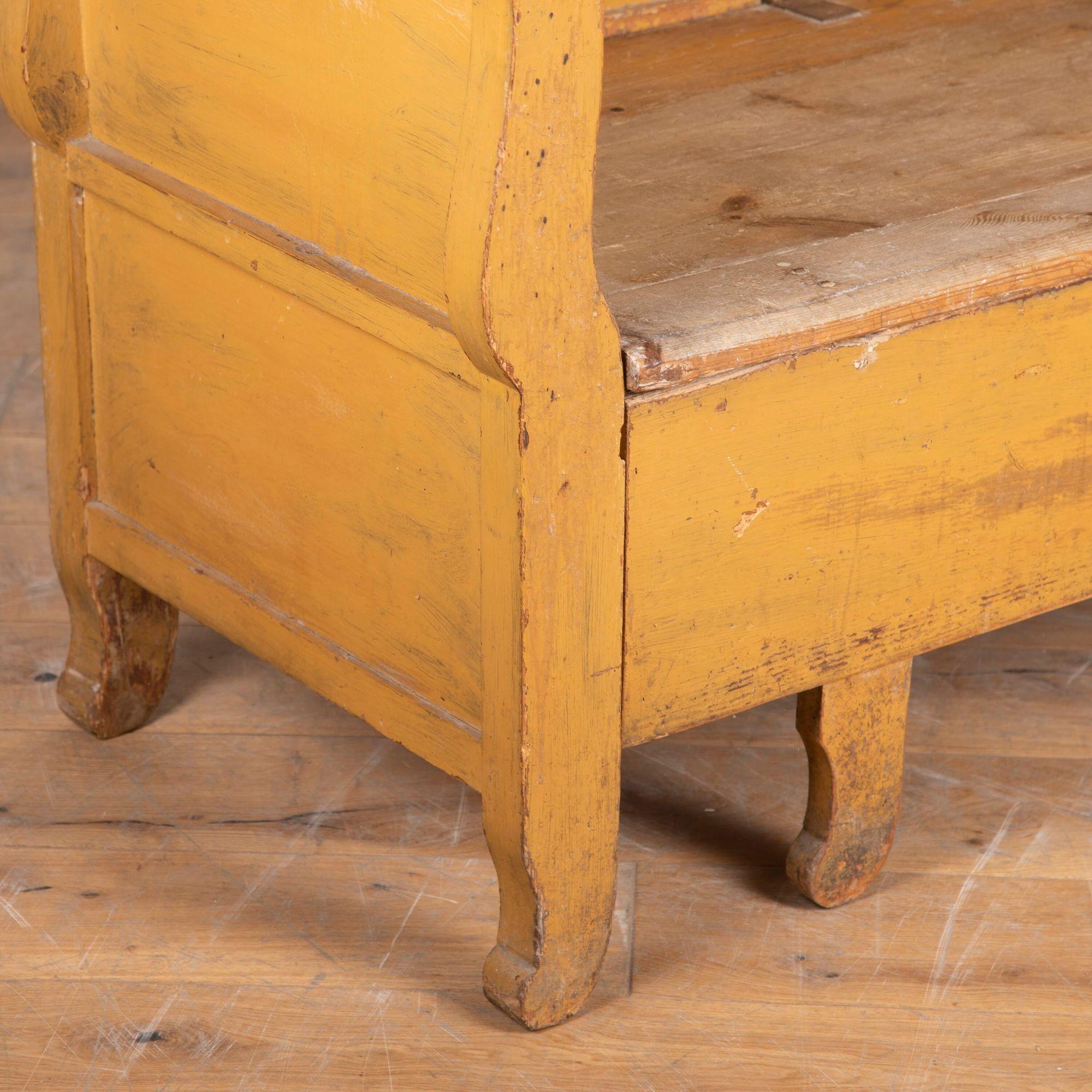 Very attractive Swedish Allmoge farmer’s bench in a warm ochre colour with a natural, time-worn patina.
With beautiful carved detail and attractive legs with a pull-out base for storage.
This is a very heavy piece, perfect for a kitchen or bedroom.