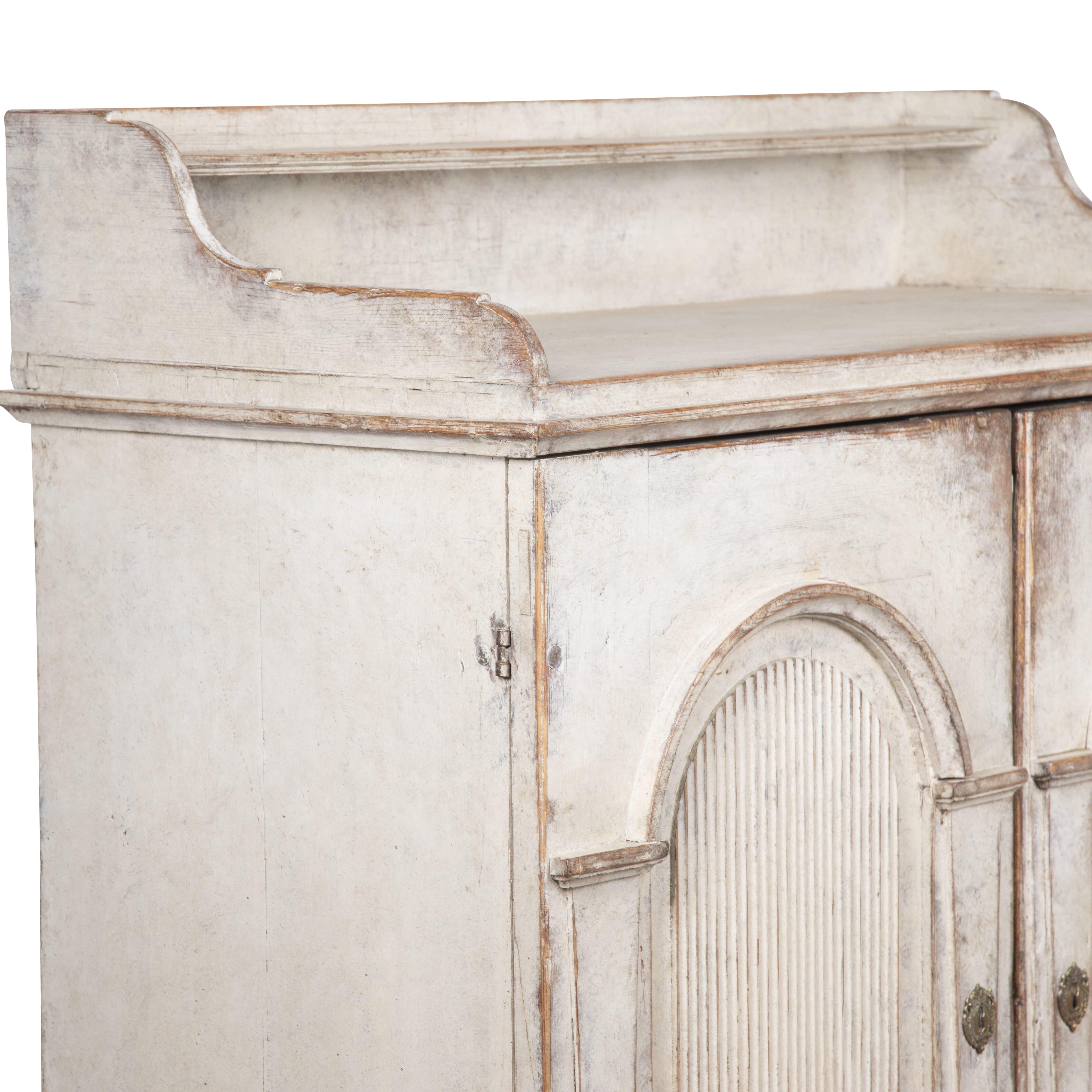 Swedish 19th Century two door buffet.
With a decorative arch and reeded detailing to the doors. 
Circa 1860.