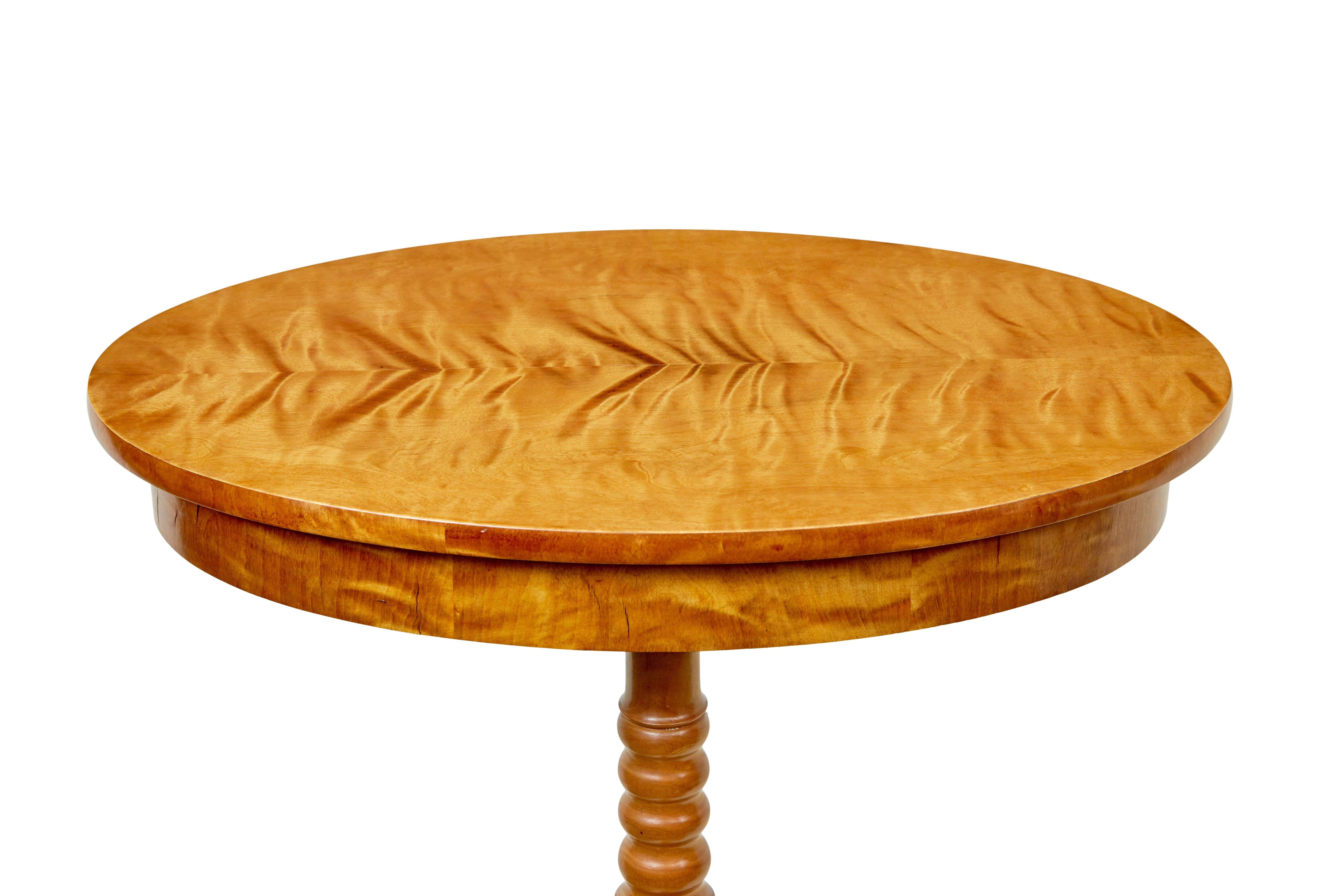 Swedish 19th century carved birch oval occasional table circa 1890.

Good quality table with multiple room uses around the home. Bookmarked flame birch oval top, supported by a turned and carved stem which stands on 3 heavily carved scrolling