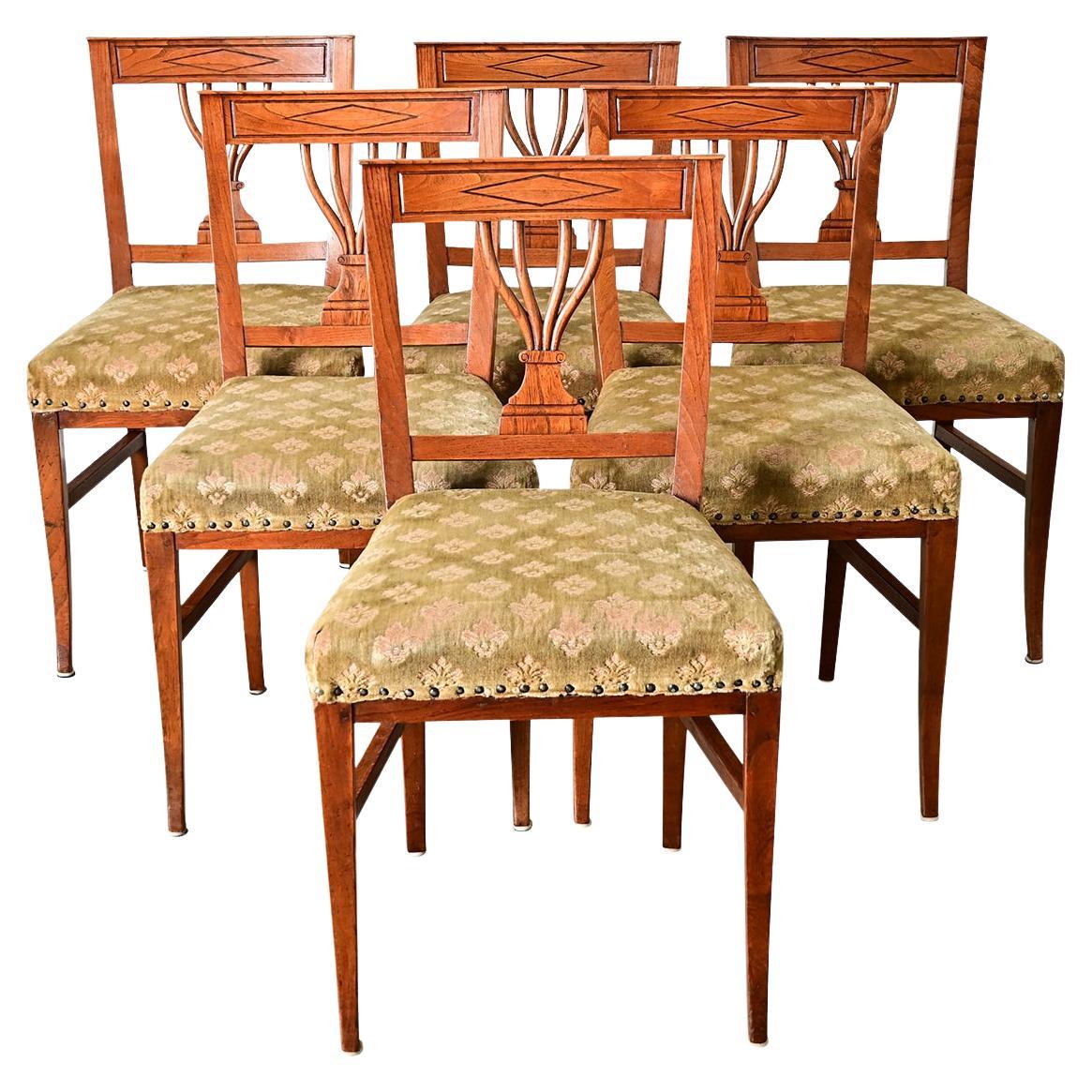 What is the difference between the Biedermeier and Empire styles?