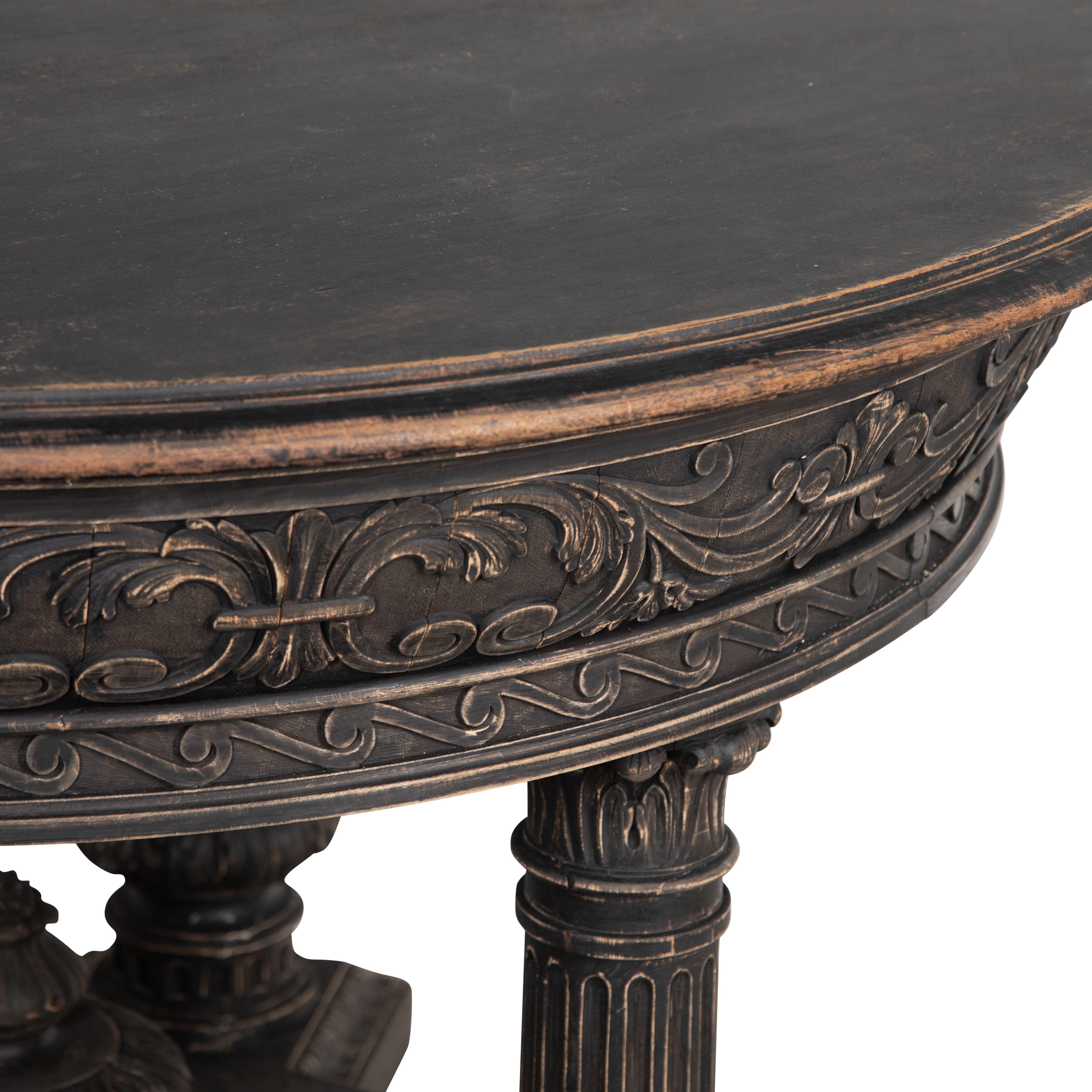 19th Century Swedish circular table.
With carved decorative detailing and in original black paint.
Circa 1860.