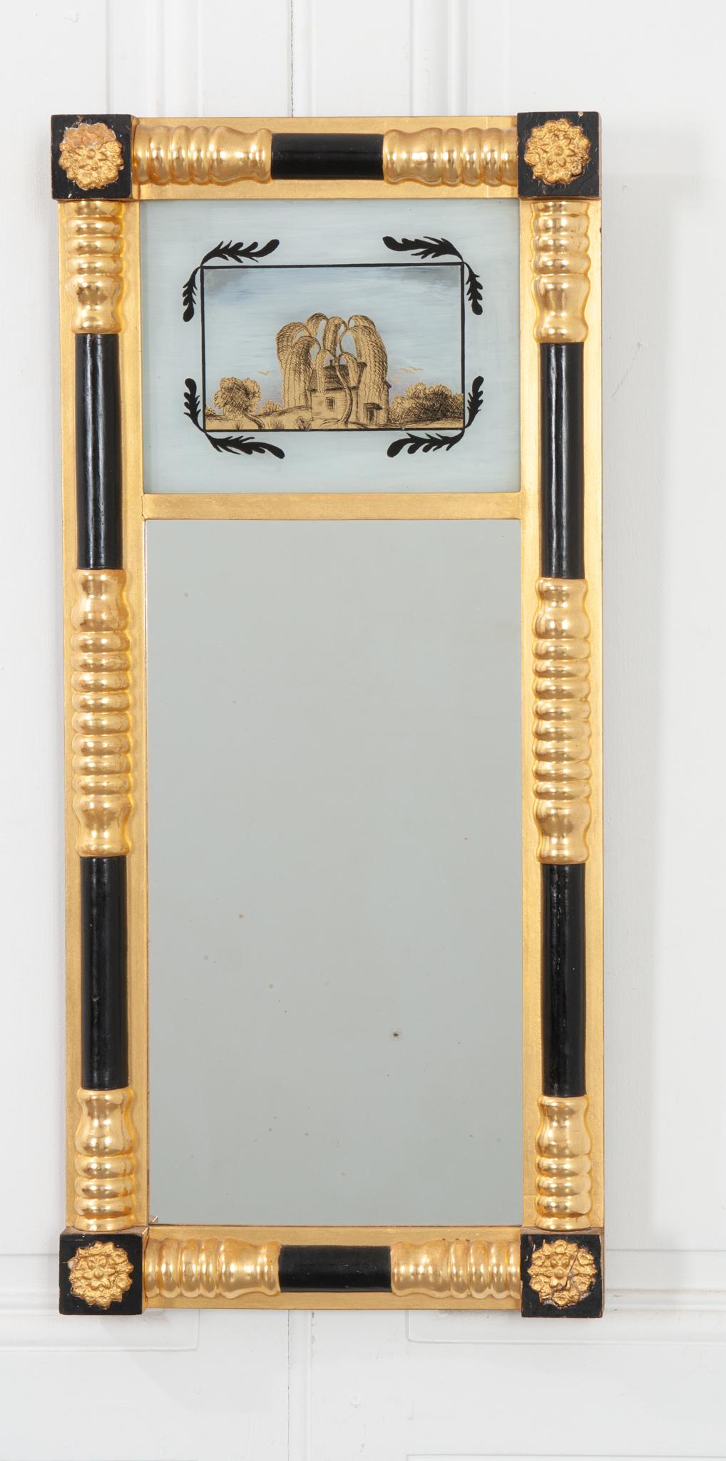 This fabulous Swedish mirror is dripping in detail, circa 1870. Eglomise mirrors have been painted on the reverse side to reveal an image from behind the glass. This one depicts a peaceful scene of a country house with a large tree shading it