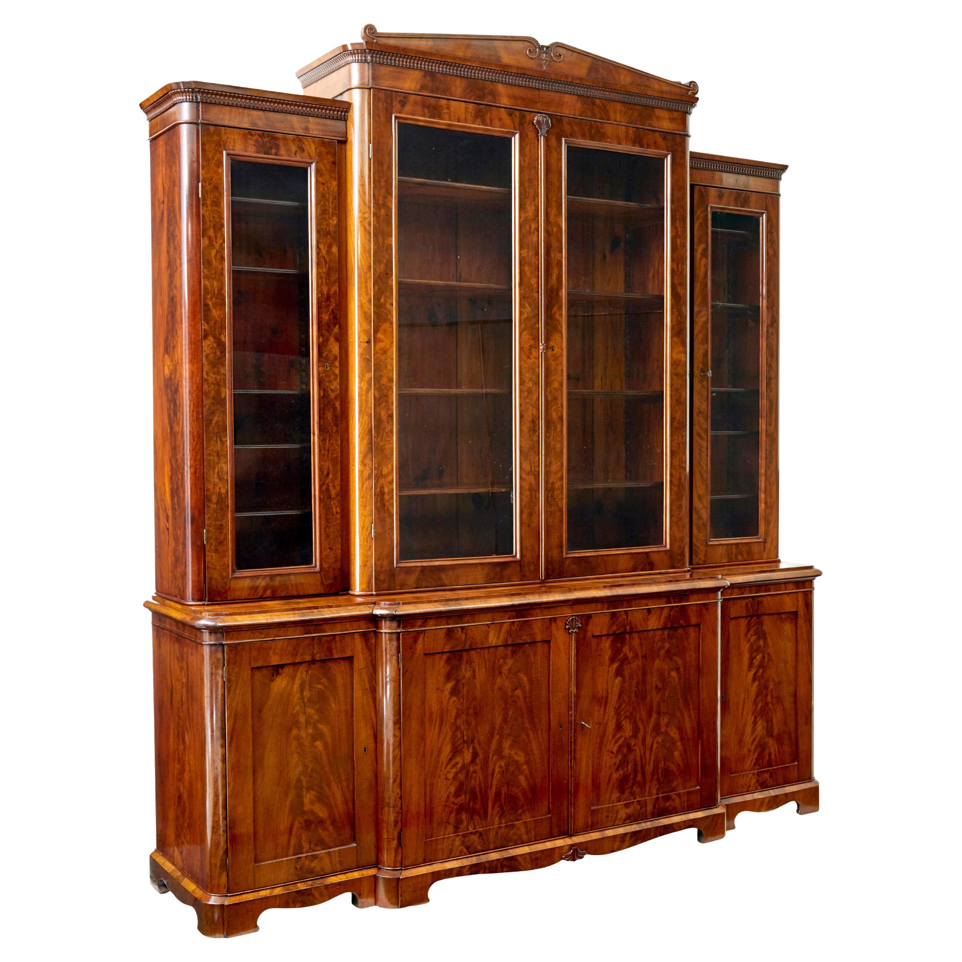 Swedish 19th century flame mahogany breakfront bookcase For Sale