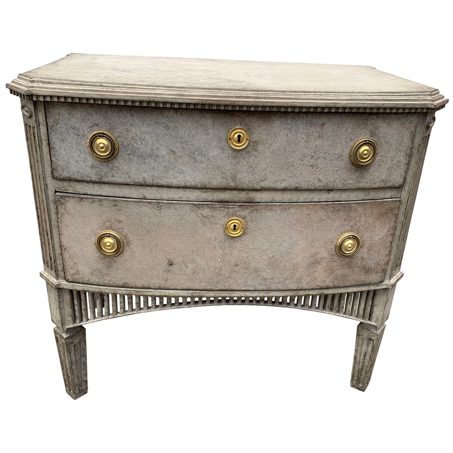 Swedish 19th century Gustavian style two-drawer dresser with brass hardware.

EUR 175 delivery to most areas of London UK, The Netherlands, Belgium, Denmark, Sweden and Northern Germany.


 