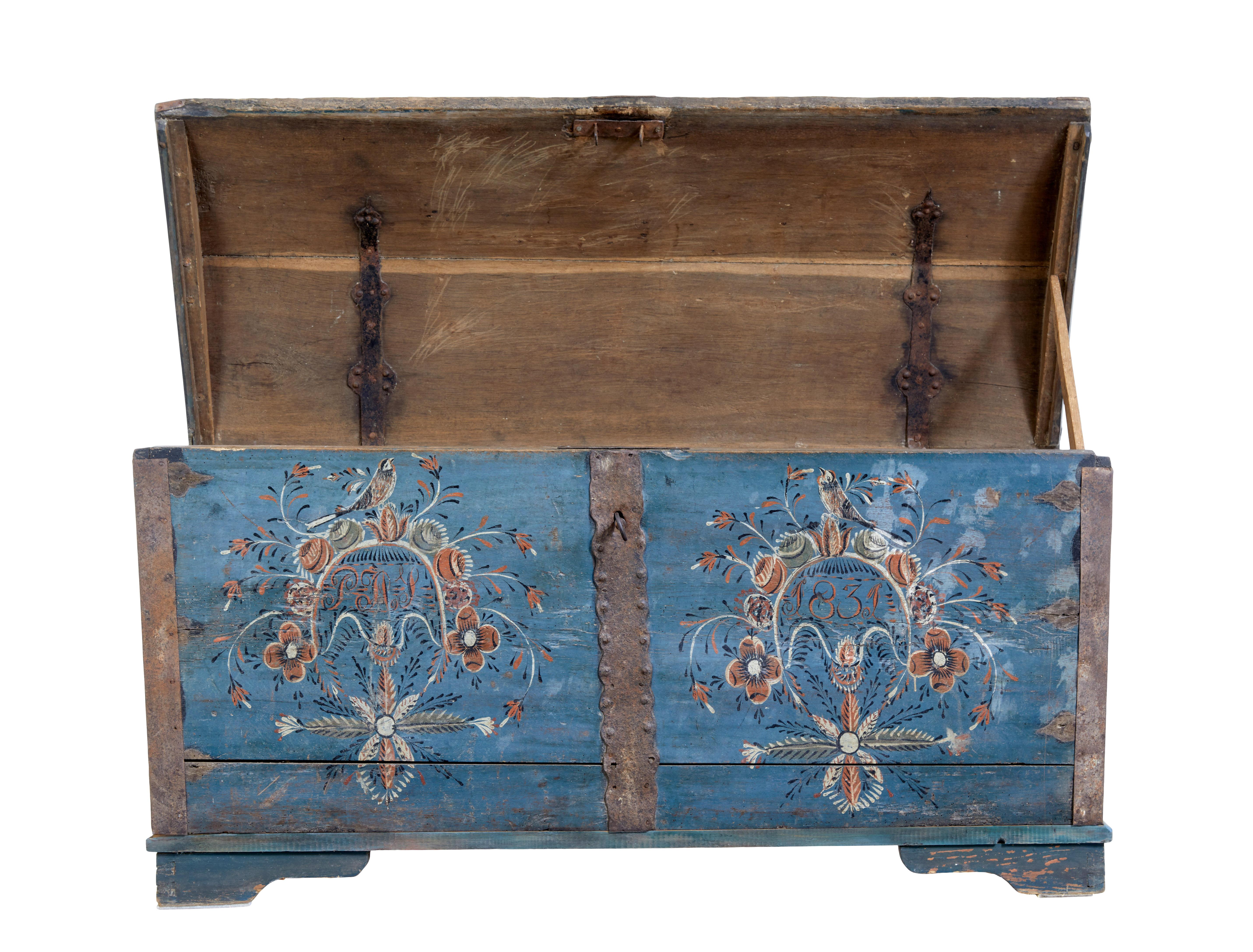 Swedish 19th century hand painted oak coffer circa 1831.

Fine quality piece of Swedish Folk Art, although we have dated this piece from the time it was painted, it is much older, given the evidence of previously fitted strap work.

Dome top