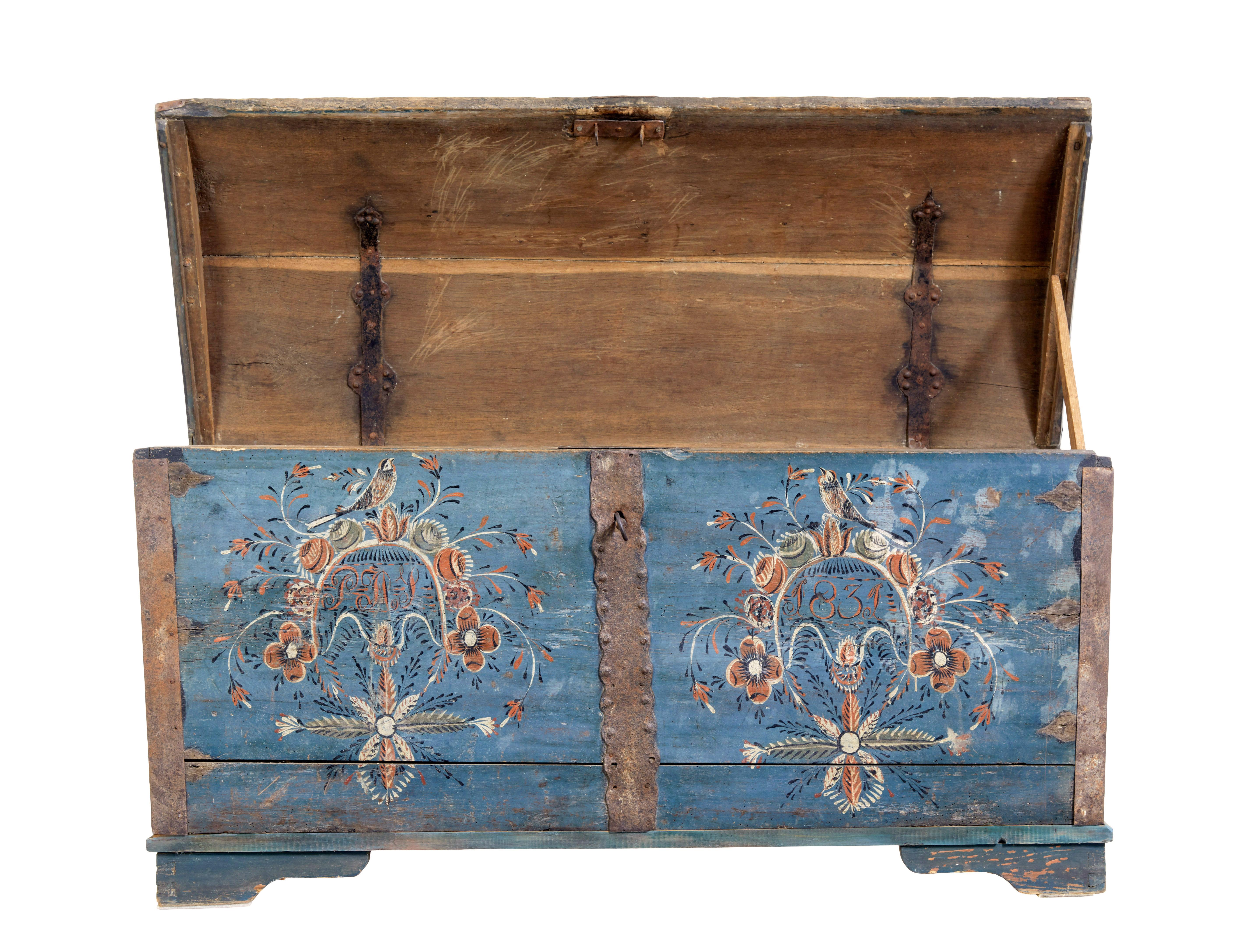 Swedish 19th century hand painted oak coffer circa 1831.

Fine quality piece of swedish folk art, although we have dated this piece from the time it was painted, it is much older, given the evidence of previously fitted strap work.

Dome top coffer,