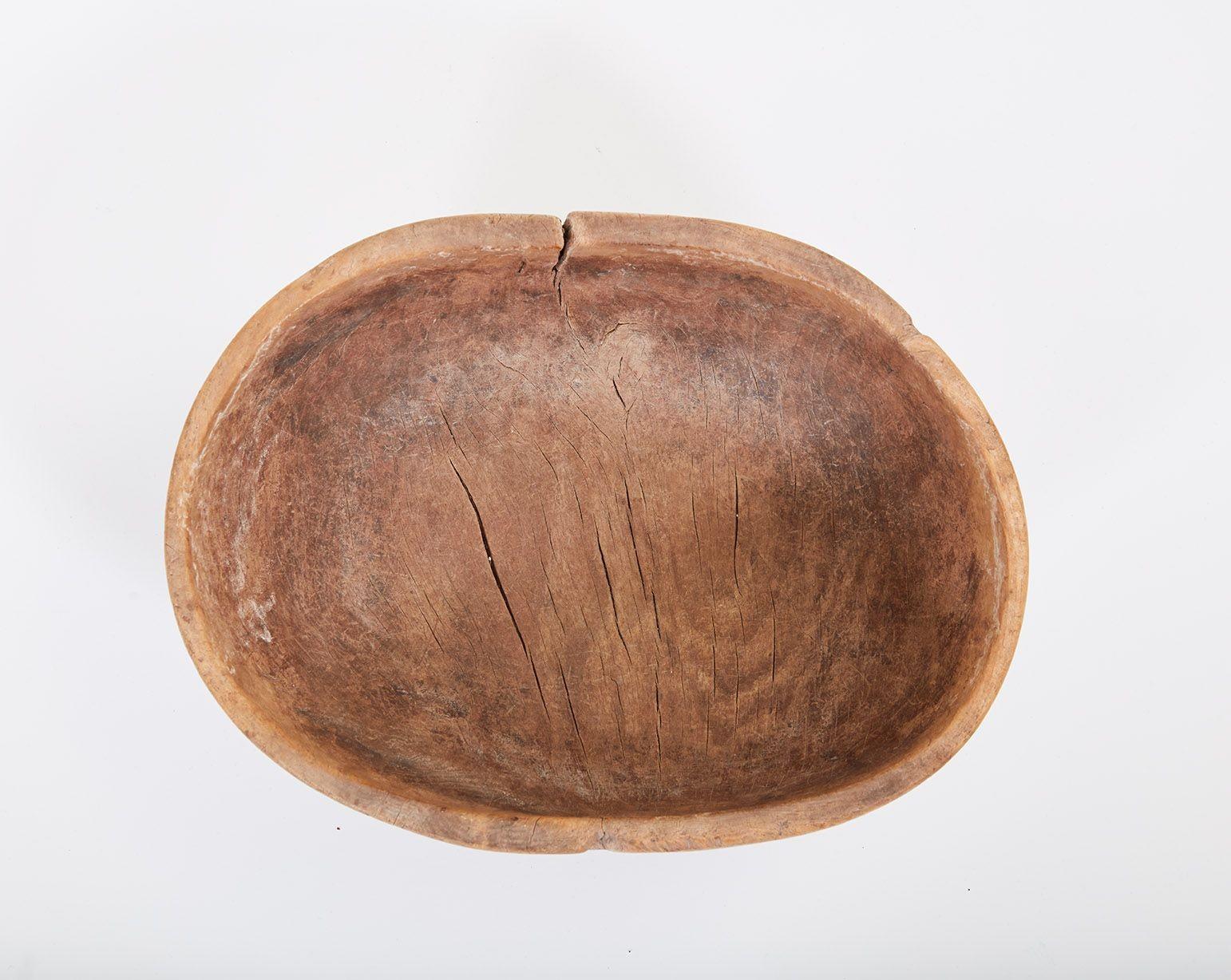 Good early 19th Century Swedish folk art root burl bowl of organic form, having owner's initials MLS on the underside, the whole with dry untouched surface.