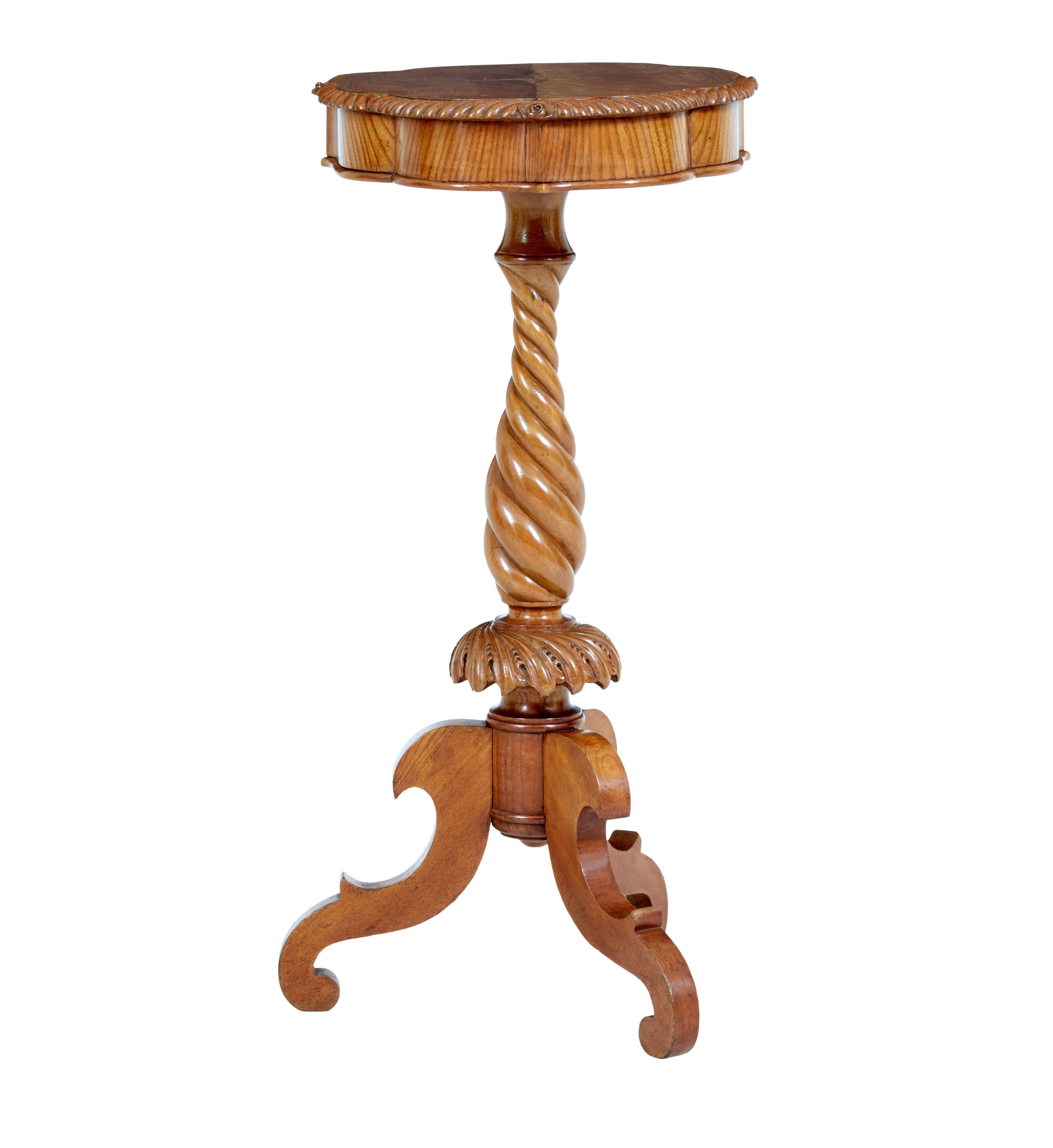 19th century small elm occasional table circa 1890.

Unusual shaped carved elm side table. Carved scalloped edge with flower detail on the middle of each side, inlaid star motif to the centre, frieze with additional beaded edge.

Standing on a