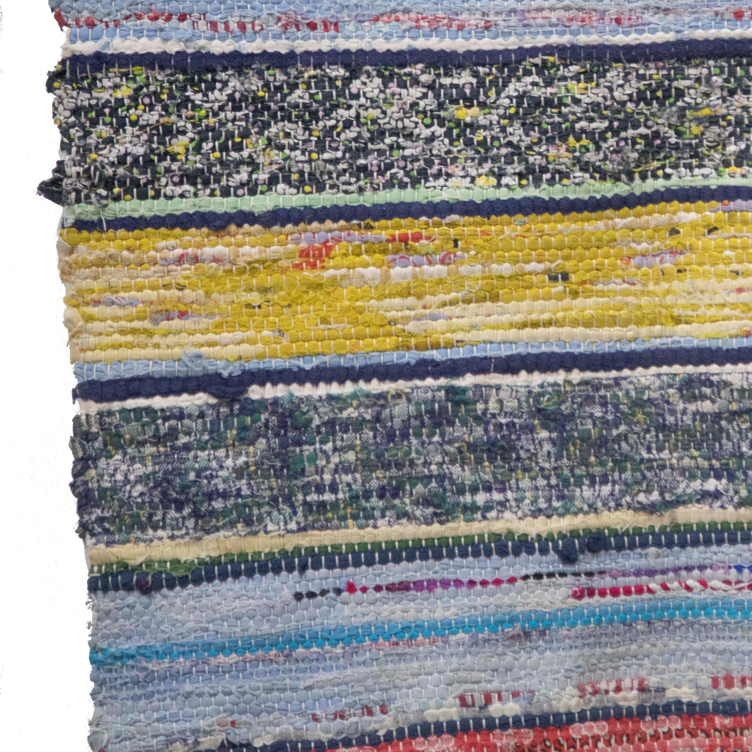 20th Century Swedish rag rug. Featuring a striped design throughout in tones of yellow, black, blue and red. This rug can be machine-washed at 30 degrees. 
RT6024583