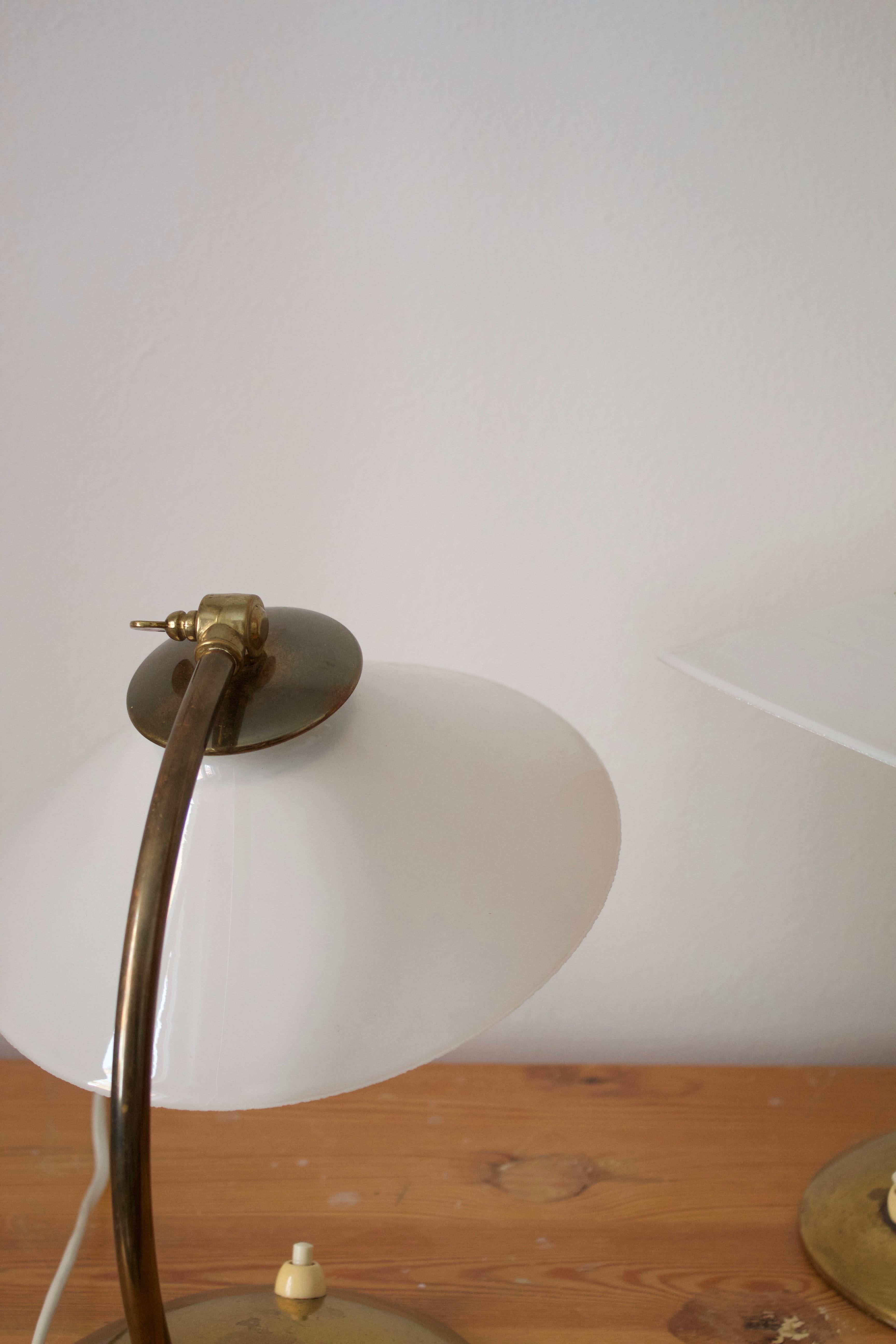 Swedish, Adjustable Desk Lights, Brass, Milk Glass, Sweden, 1940s In Good Condition In High Point, NC