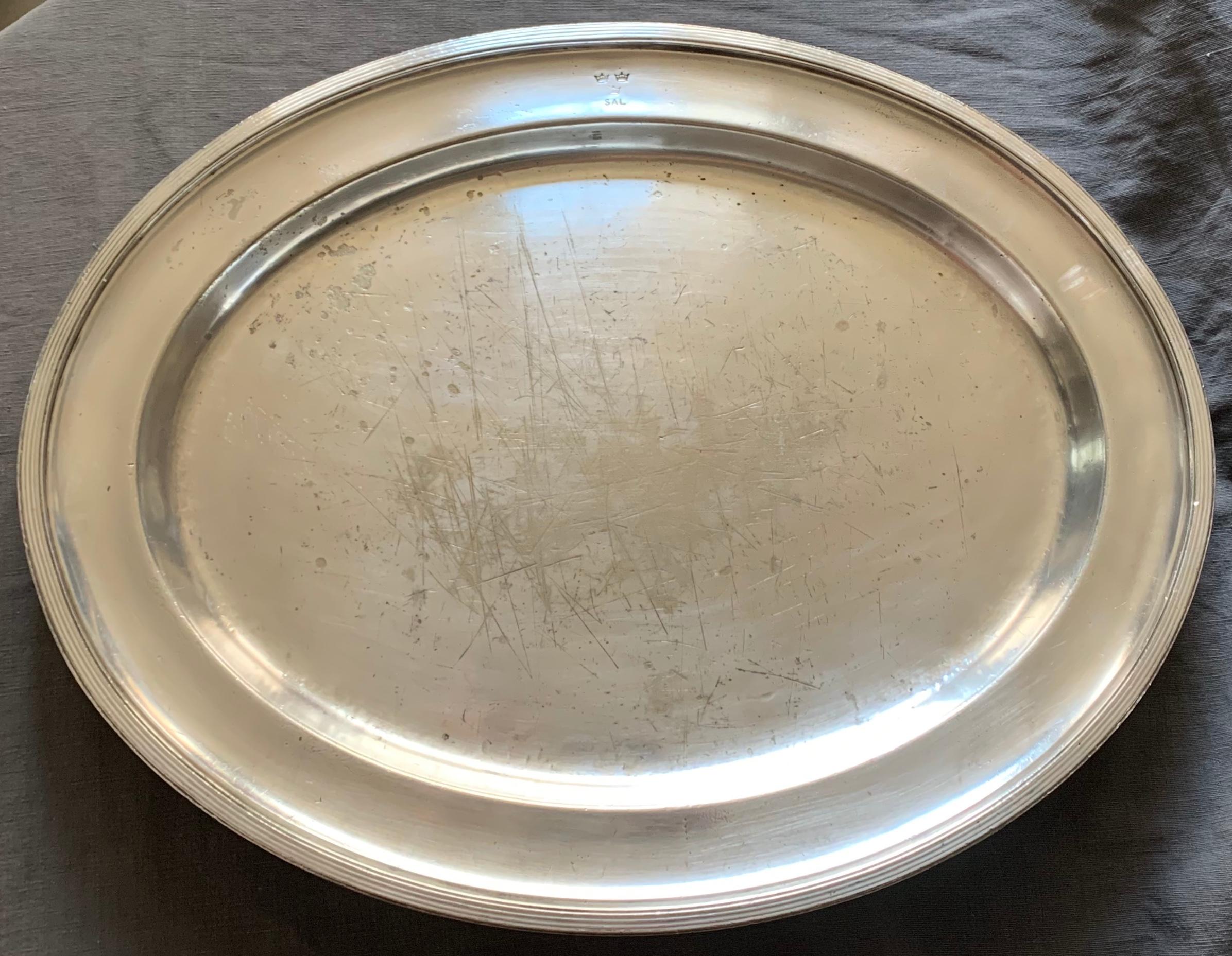 Swedish American Line large silver plated tray. Large heavy oval silver plated neoclassical style tray with the crowned SAL stamped of the famous Swedish American Lines. Stamped 
