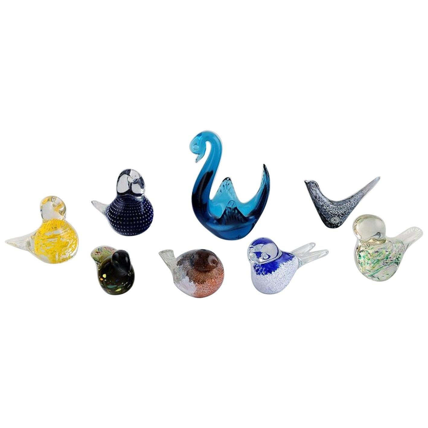 Schwedische und andere Glaskünstler, darunter Reijmyre, acht Vogelfiguren