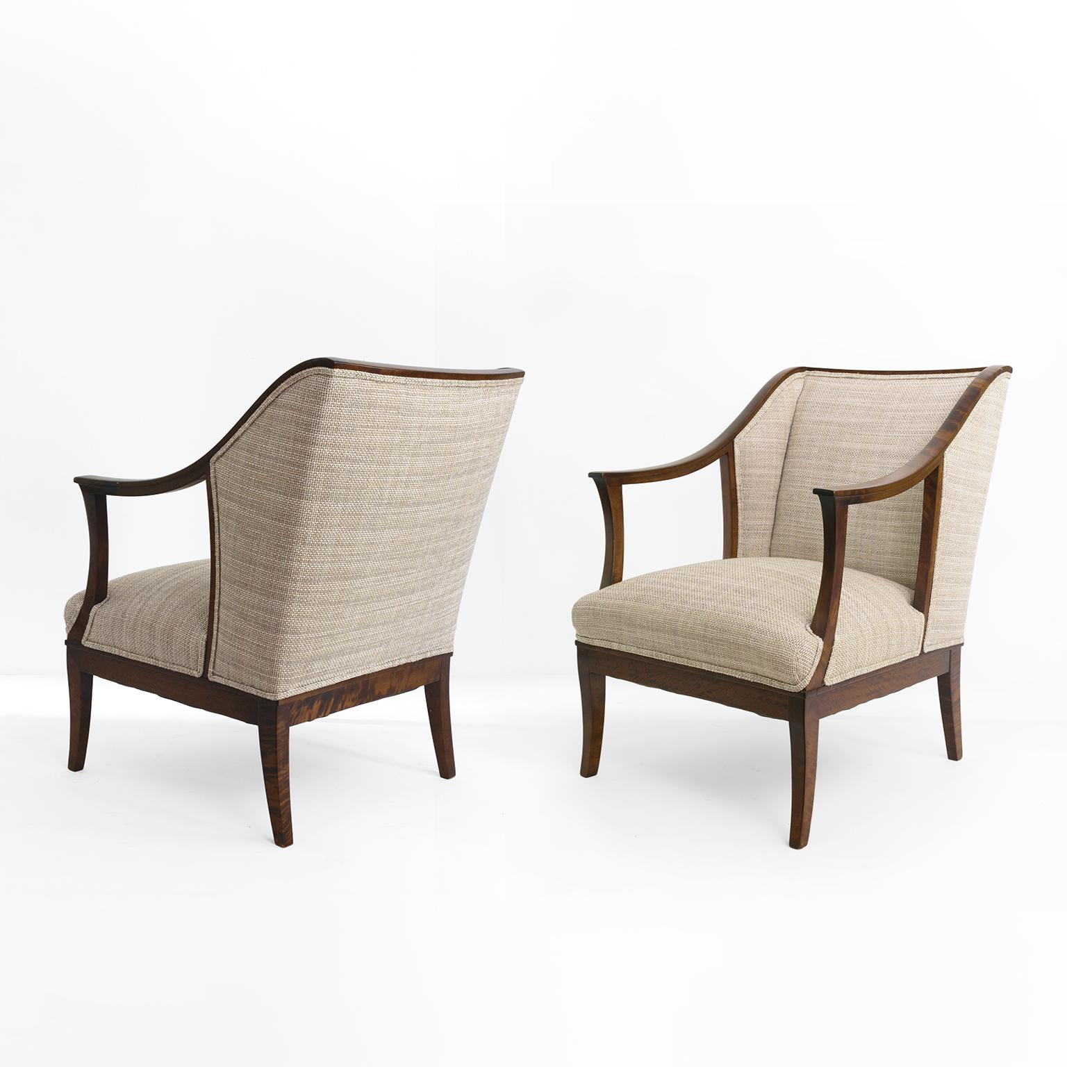 Pair of SMF Bodafors. made Swedish armchairs in stained solid birch wood. The chairs’ frames are constituted from a variety of gentle arched curves. Fully restored the chairs have been newly upholstered and frames newly polished. 

Measures: