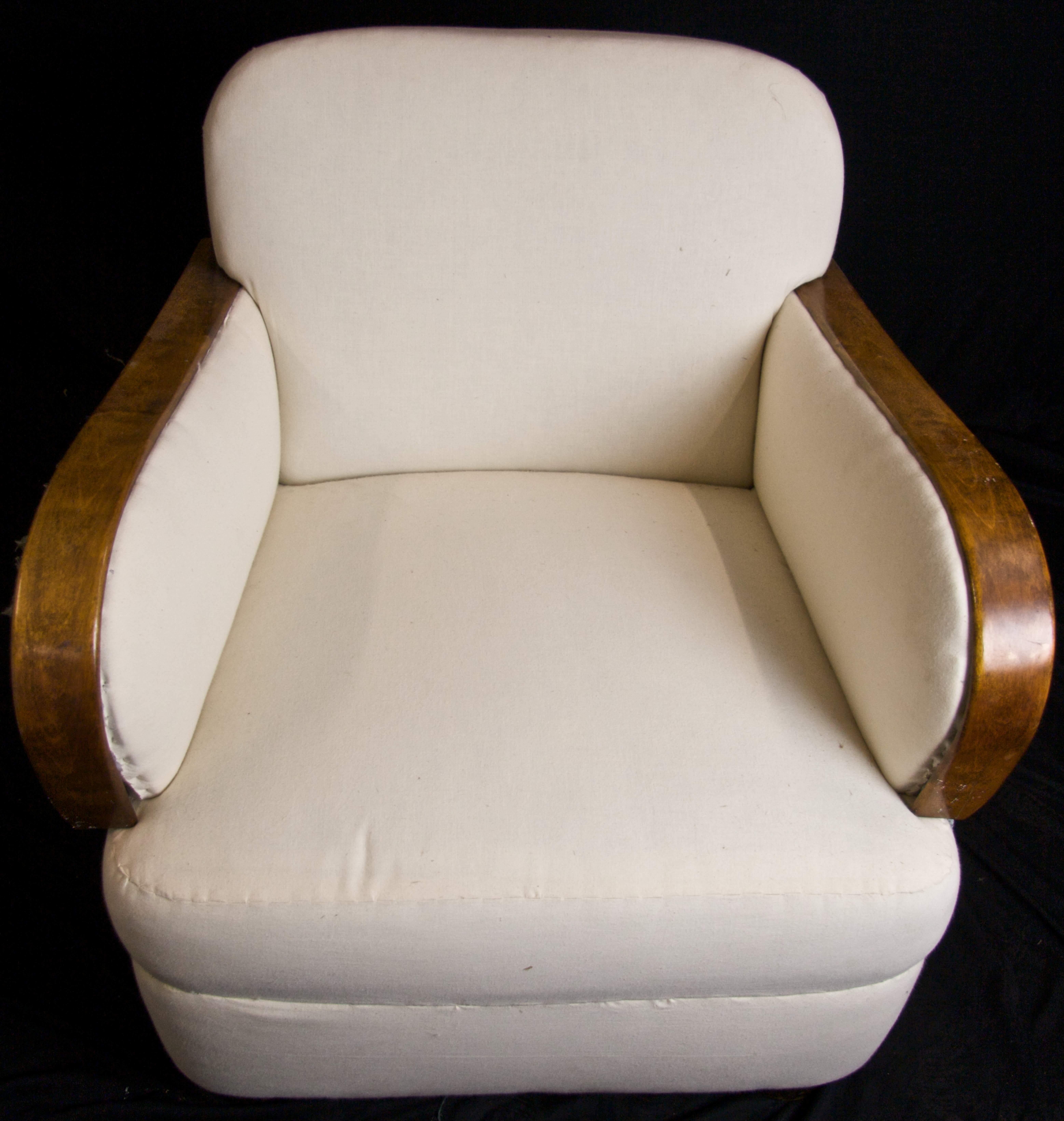 This is an unusual pair of original Swedish Art Deco armchairs with deep padded seats and back and shorter golden birch bentwood arms in a rich honey color French polish finish.

The extra deep fully sprung seats on these armchairs make for a great