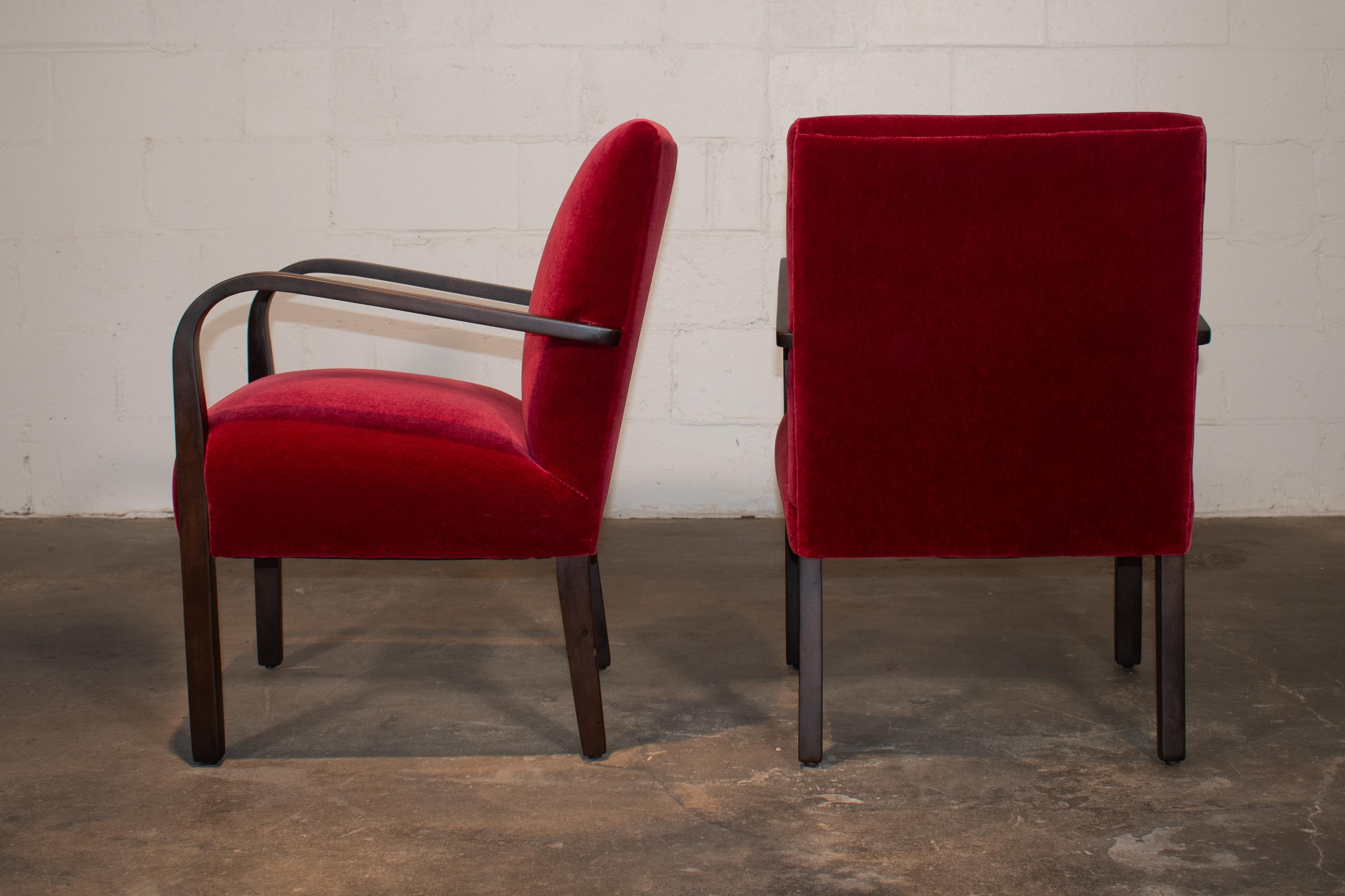 Pair of Art Deco arm chairs with steam bent birch arms. As Scandinavian interiors often have very low ceilings to contain heat, seating tends to be diminutive in footprint  but is deceptively comfortable as a result of the seat depth and pitch.