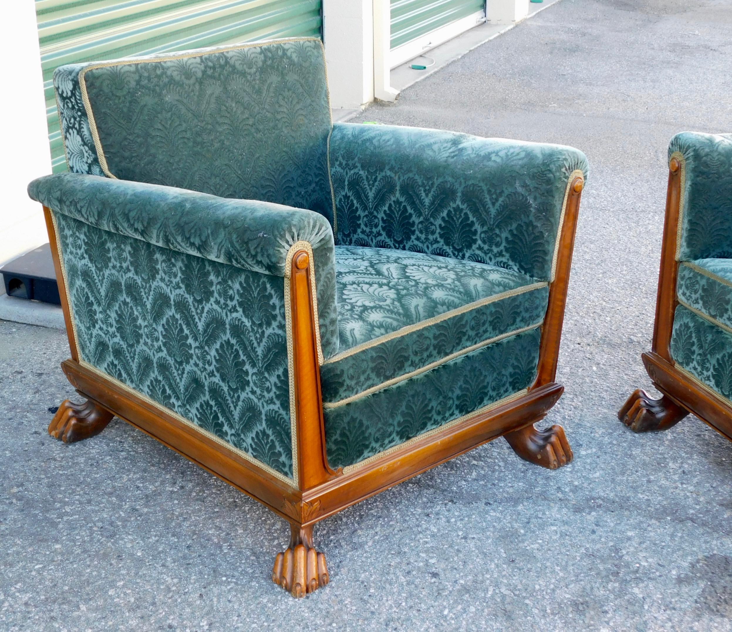 Extremely rare Swedish Art Deco club chairs with claw feet (front and back) by renowned Swedish designer, Eugen Höglund. Rendered in stained birch wood . All original in original fabric. In very good condition and ready for use as is or for