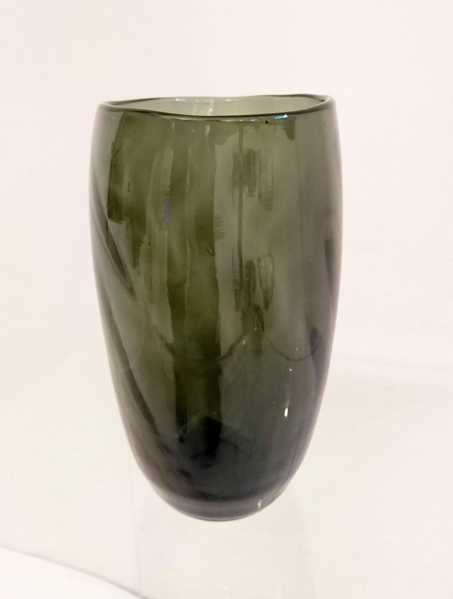 Dark gray cone shaped glass vase. The design is made in the shape of a swirl. No marks underneath but you can see the mark from being hand blown.