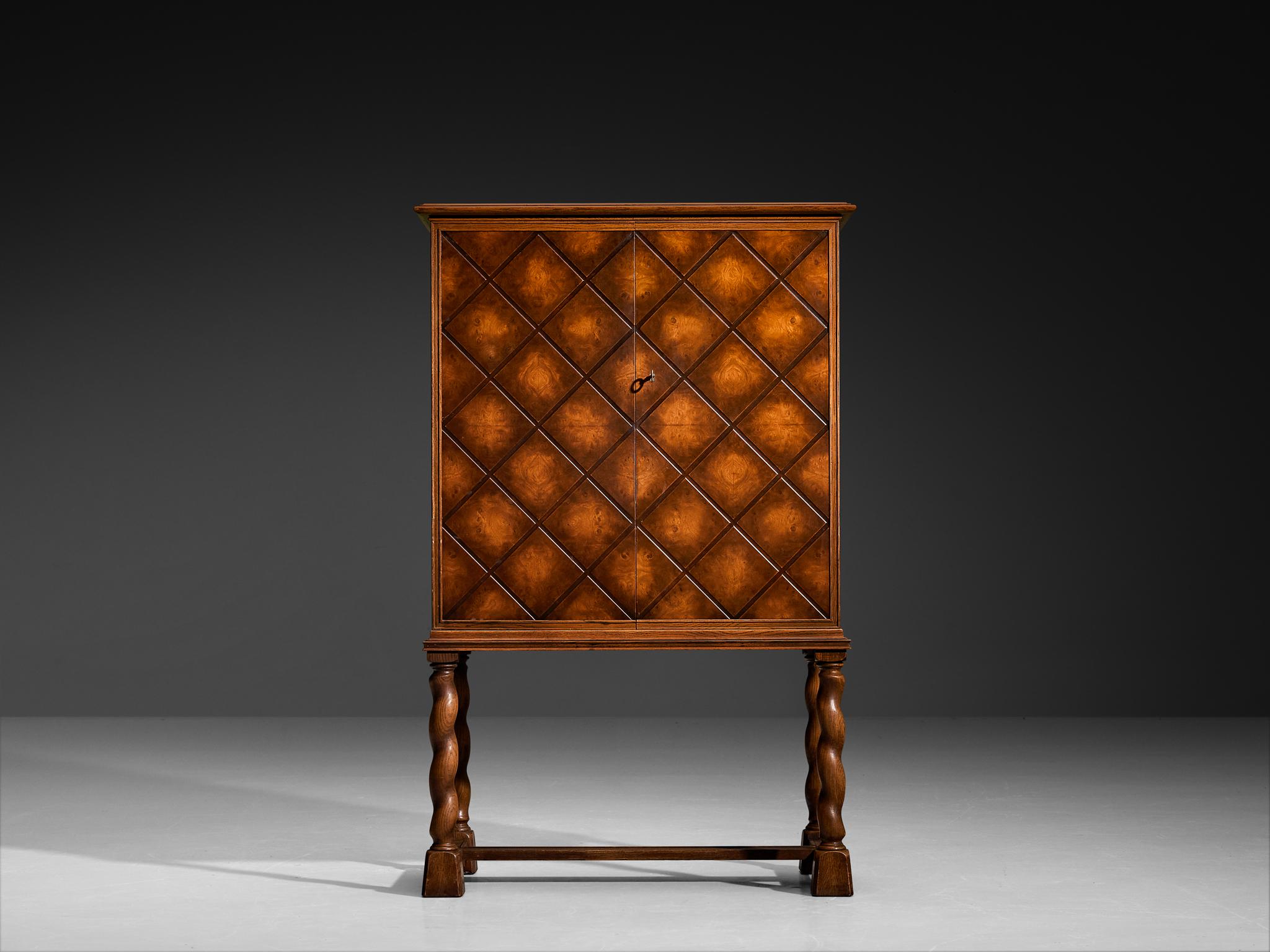 Swedish Art Deco High-Legged Cabinet with Carved Doors in Oak In Good Condition For Sale In Waalwijk, NL