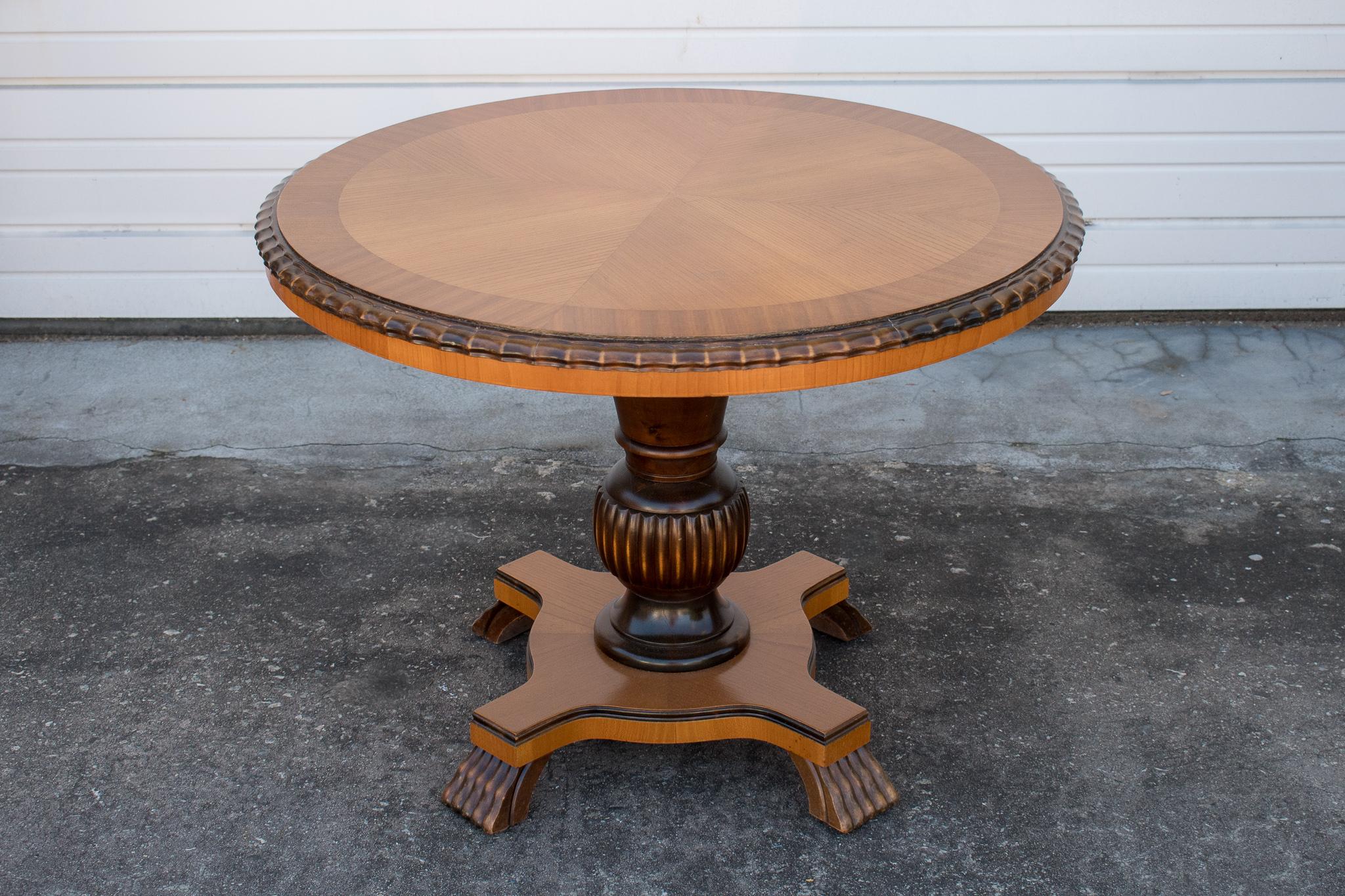 Handsome end or side table of golden book-matched elm on a golden flame birch pedestal with ebonized accents.